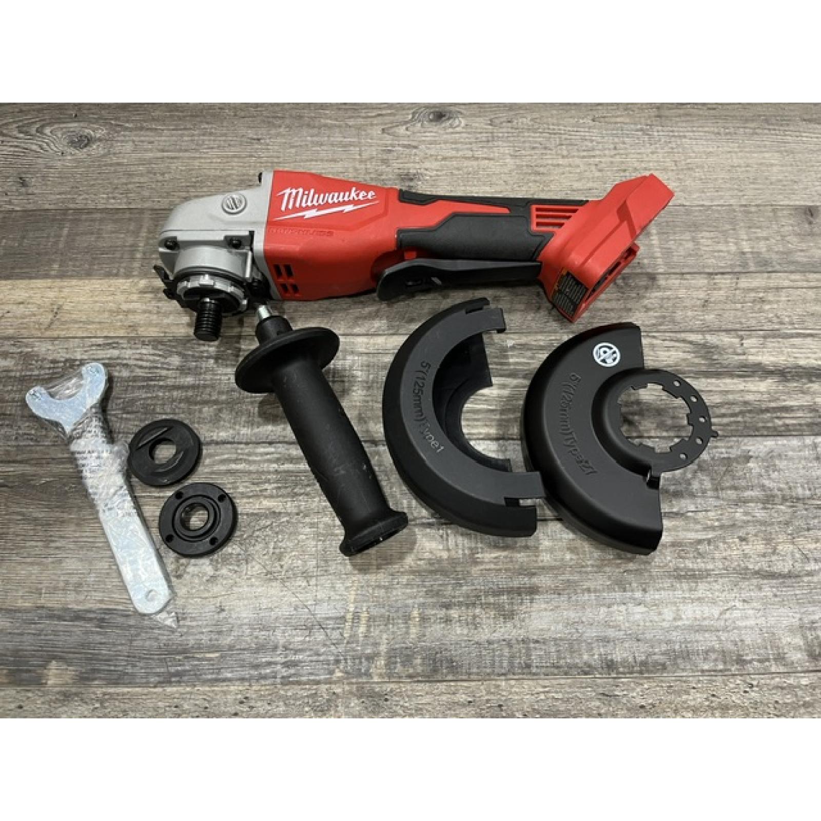 AS-IS Milwaukee 18V Lithium-Ion Brushless Cordless 4-1/2 in./5 in. Grinder w/Paddle Switch (Tool-Only)