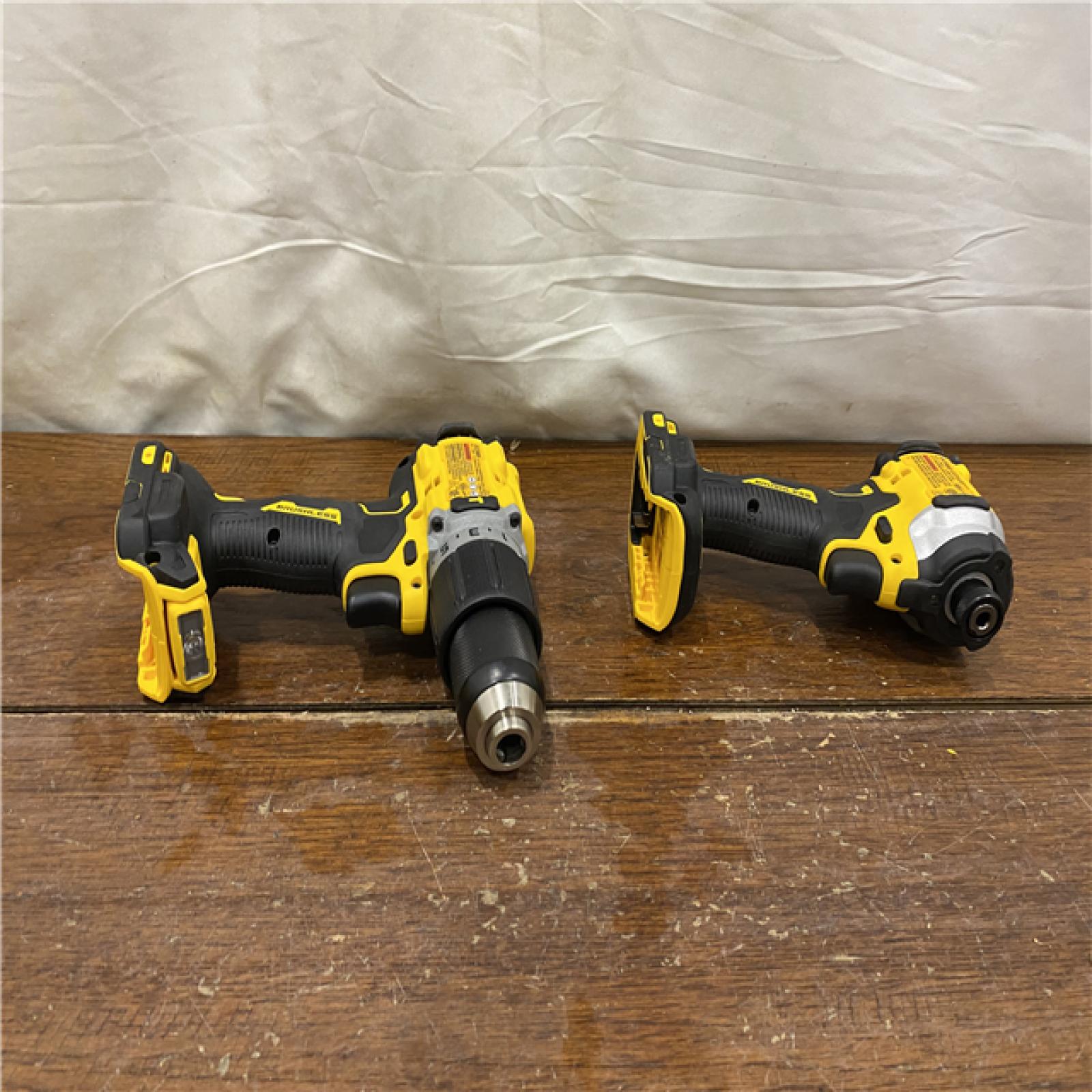 AS-IS DEWALT 20V MAX XR Hammer Drill and ATOMIC Impact Driver 2 Tool Cordless Combo Kit with (2) 4.0Ah Batteries, Charger, and Bag
