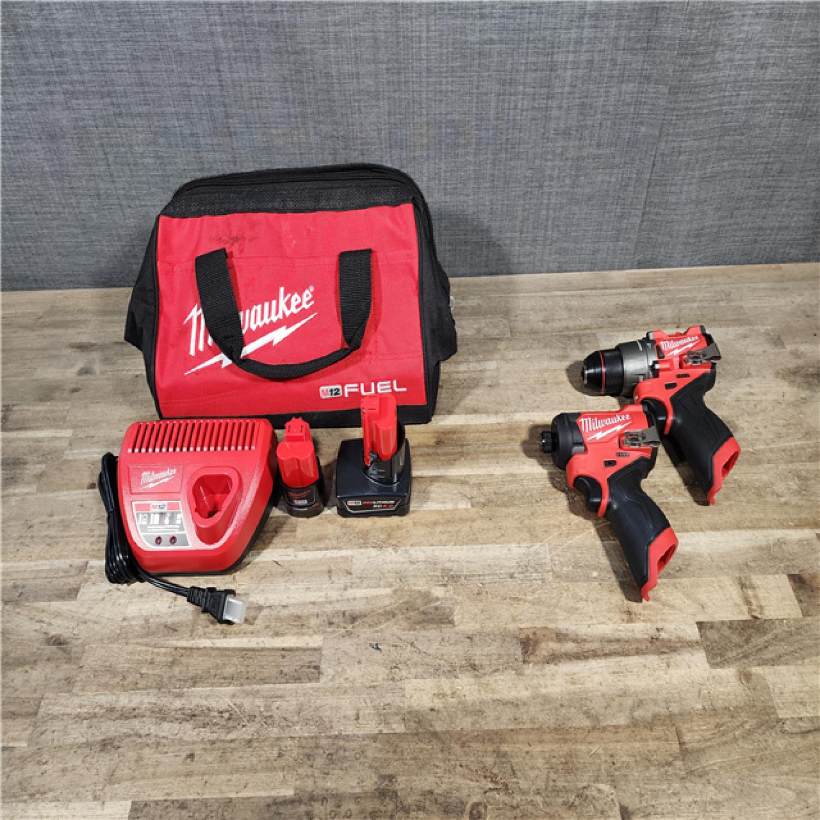 HOUSTON LOCATION - AS-IS Milwaukee FUEL 12-Volt Lithium-Ion Brushless Cordless Hammer Drill and Impact Driver Combo Kit