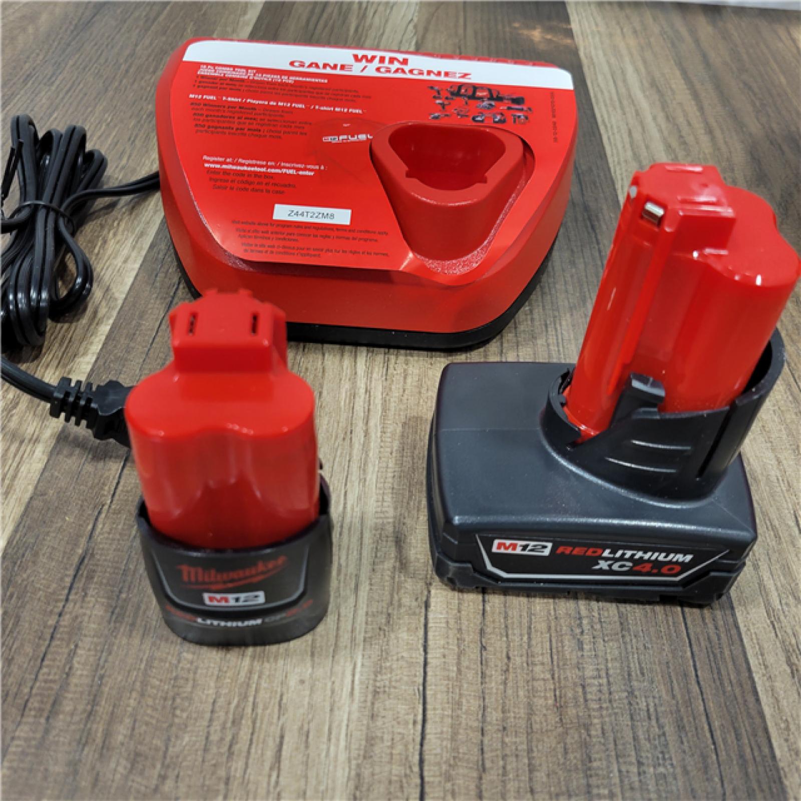 AS-IS  Milwaukee 3497-22 12V Brushless Hammer Drill and Impact Driver Combo Kit
