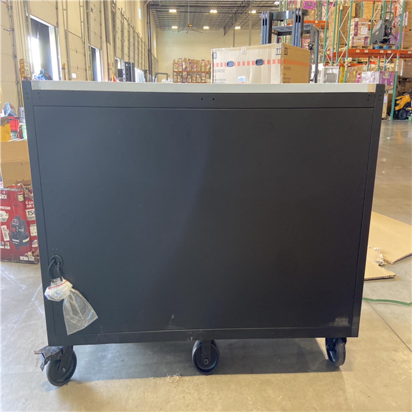 DALLAS LOCATION - Husky Modular Tool Storage 62 in. W X 24 in. D Heavy Duty Matte Black Mobile Workbench Cabinet with Stainless Steel Top