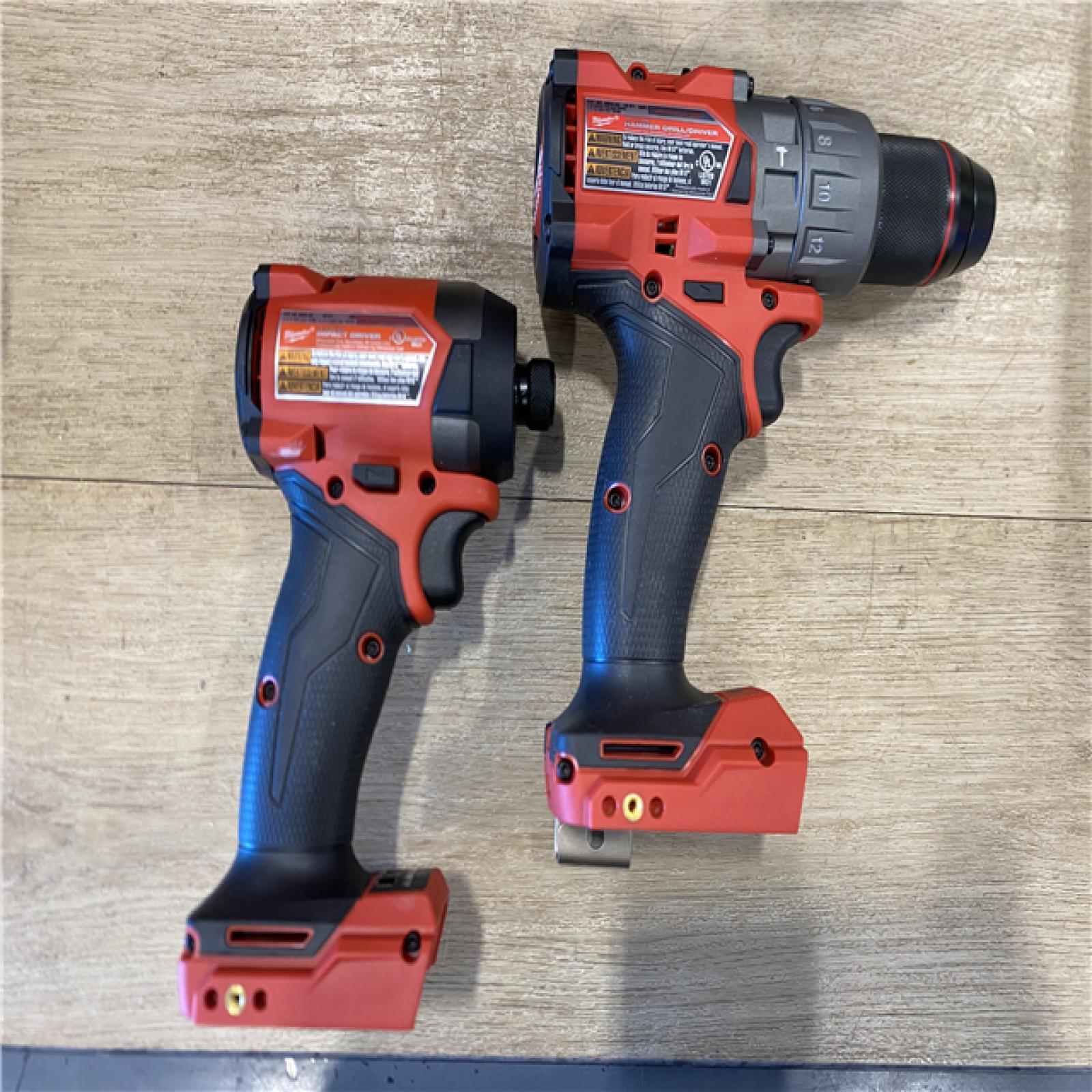 AS-IS Milwaukee FUEL 18V Lithium-Ion Brushless Cordless Hammer Drill and Impact Driver Combo Kit