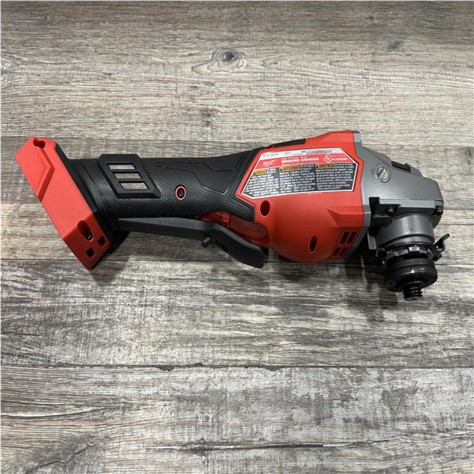 AS-IS Milwaukee FUEL 18-Volt Lithium-Ion Brushless Cordless 4-1/2 in./6 in. Braking Grinder with Paddle Switch (Tool-Only)