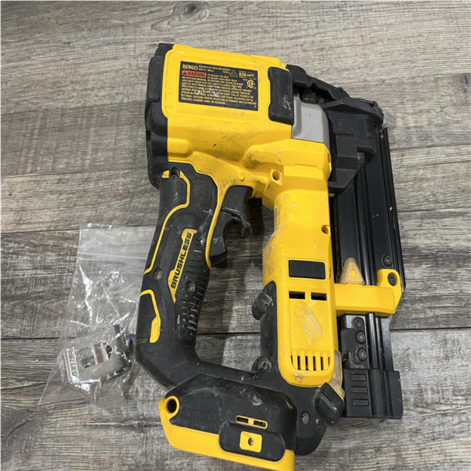 AS-IS DEWALT ATOMIC 20V MAX Lithium Ion Cordless 23 Gauge Pin Nailer (Tool Only)