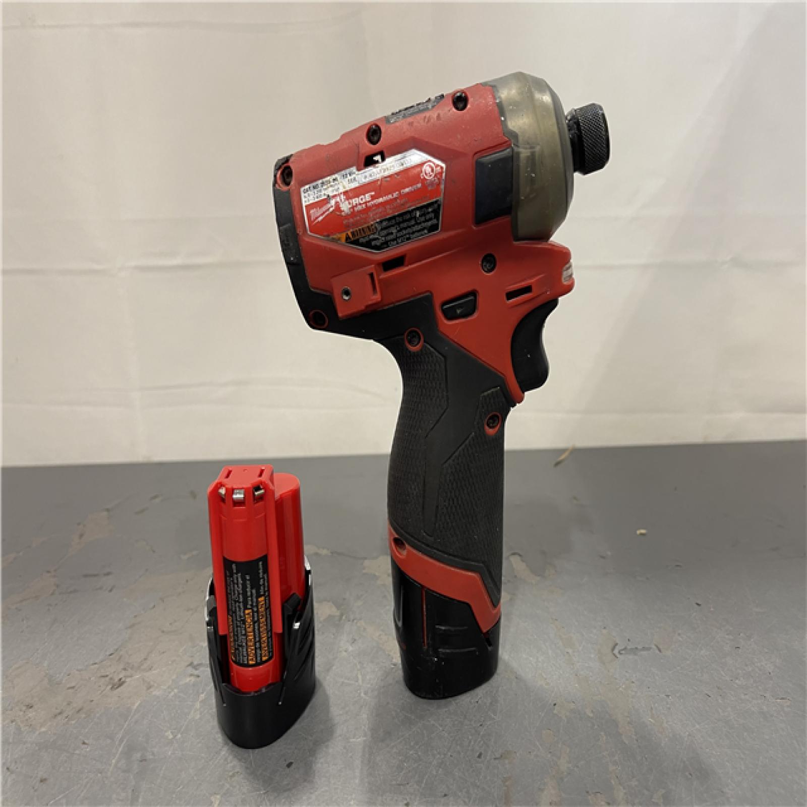 AS-IS - Milwaukee M12 FUEL SURGE 12V Lithium-Ion Brushless Cordless 1/4 in. Hex Impact Driver Compact Kit