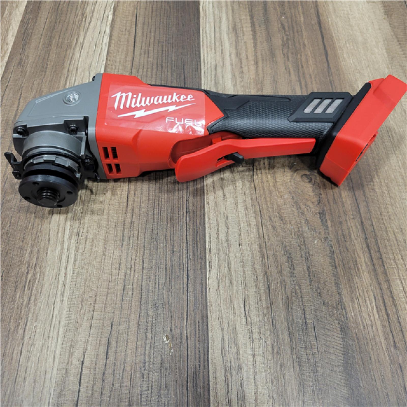 AS-IS Milwaukee 2880-20 M18 FUEL 18-Volt Lithium-Ion Brushless Cordless 4-1/2 in./5 in. Grinder W/Paddle Switch (Tool-Only)
