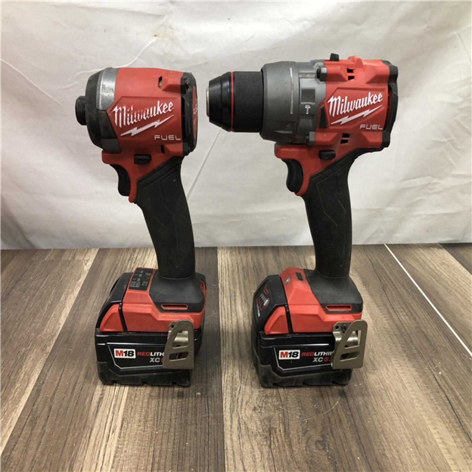 AS-IS Milwaukee FUEL 18V Lithium-Ion Brushless Cordless Hammer Drill and Impact Driver Combo Kit