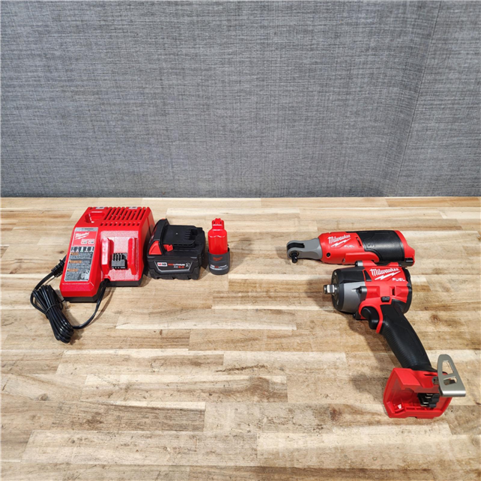HOUSTON LOCATION - AS-IS Milwaukee 2 Tool Combo Kit W/ (2) Battery & Charger