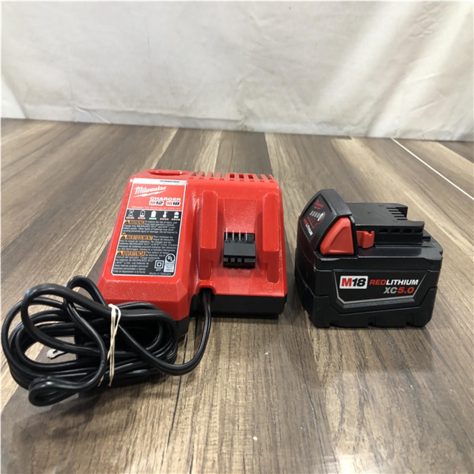 AS-IS Milwaukee 18-Volt Lithium-Ion XC Starter Kit with One 5.0Ah Battery and Charger
