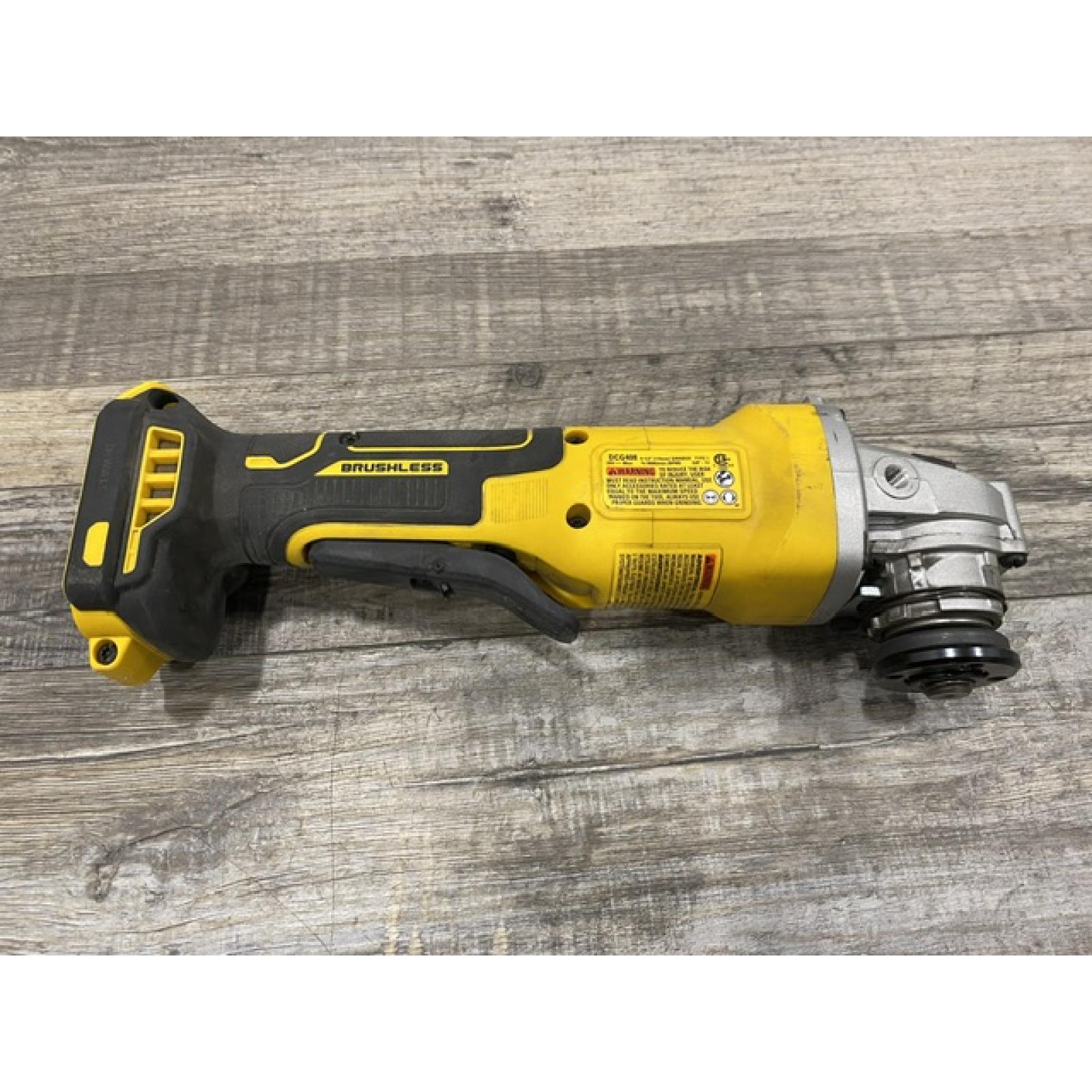AS-IS DEWALT 20V MAX Cordless Brushless 4-1/2 in. Angle Grinder with Paddle Switch (Tool Only)