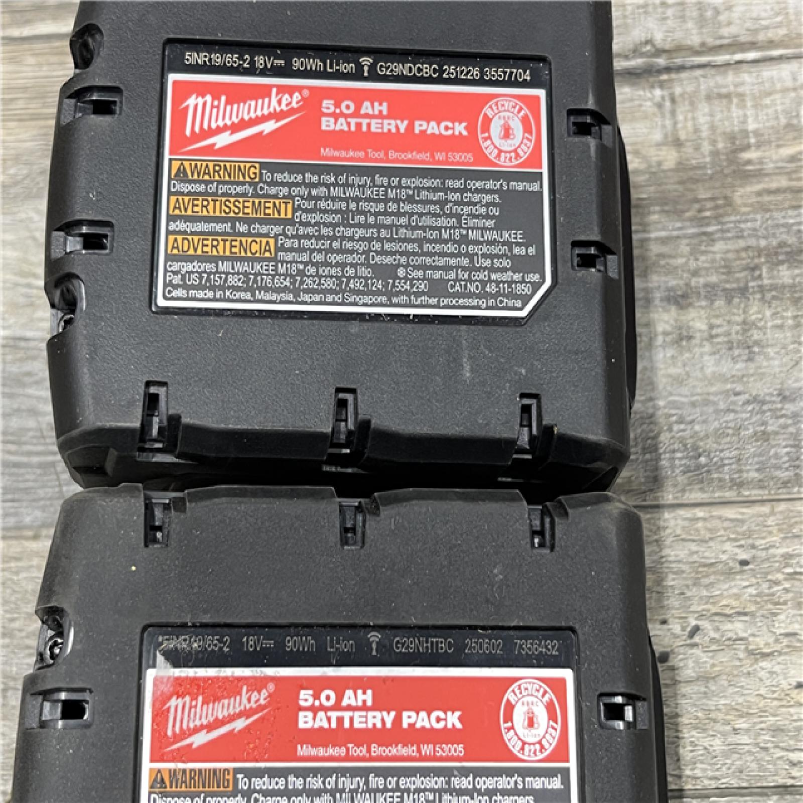 AS-IS Milwaukee 18-Volt Lithium-Ion XC Starter Kit with (2) 5.0Ah Batteries and Charger