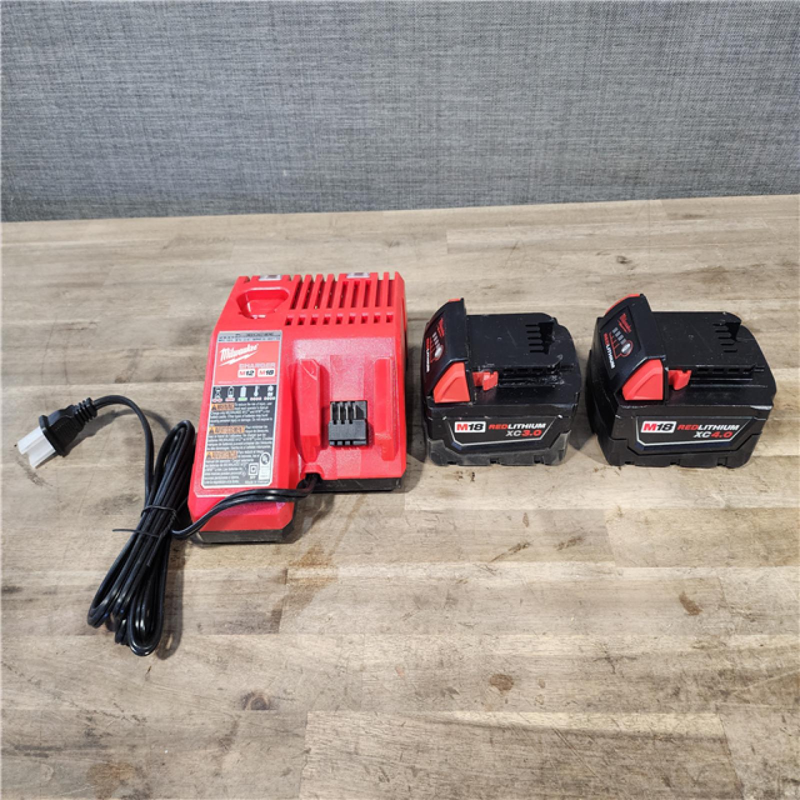 HOUSTON LOCATION - AS-IS Milwaukee 2 Tool Combo Kit W/ (2) Battery & Charger