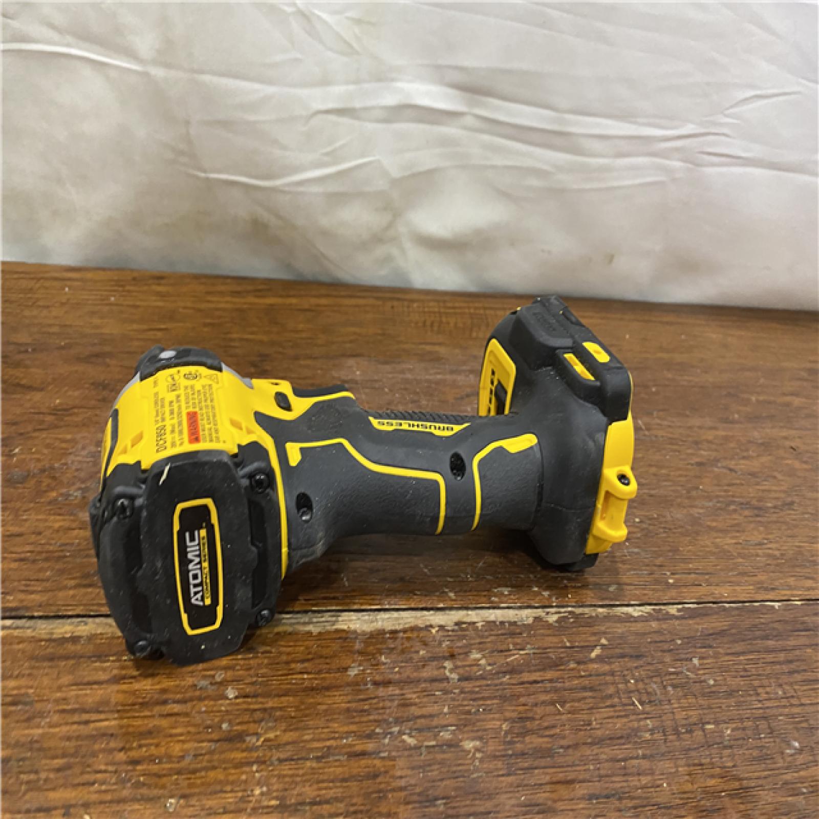 AS-IS DEWALT ATOMIC 20V MAX Lithium-Ion Cordless 1/4 in. Brushless Impact Driver Kit, 5 Ah Battery, Charger, and Bag