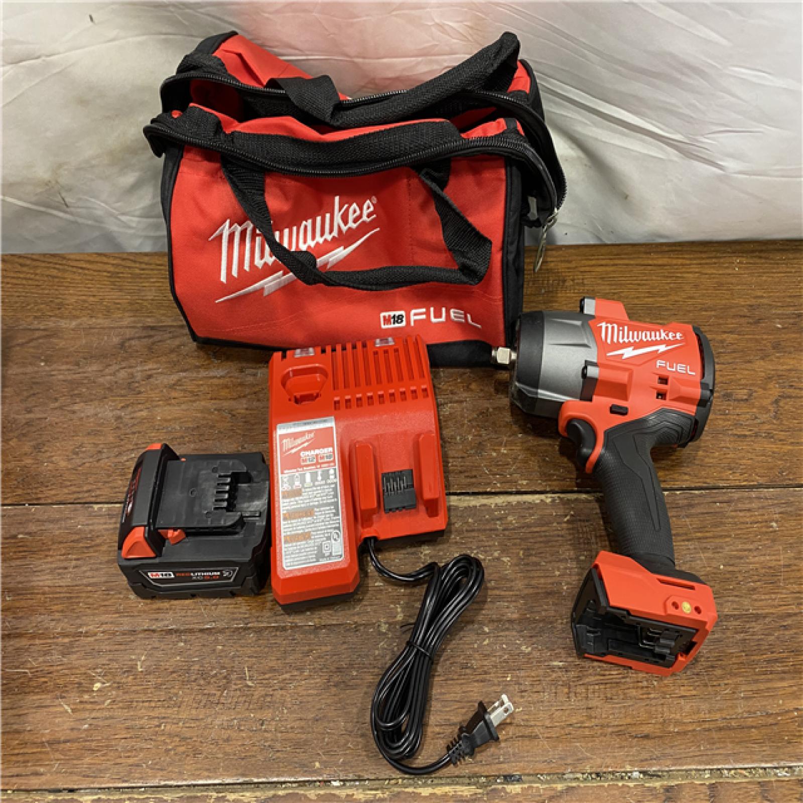 AS-IS Milwaukee M18 FUEL 1/2 High Torque Impact Wrench with Friction Ring Kit