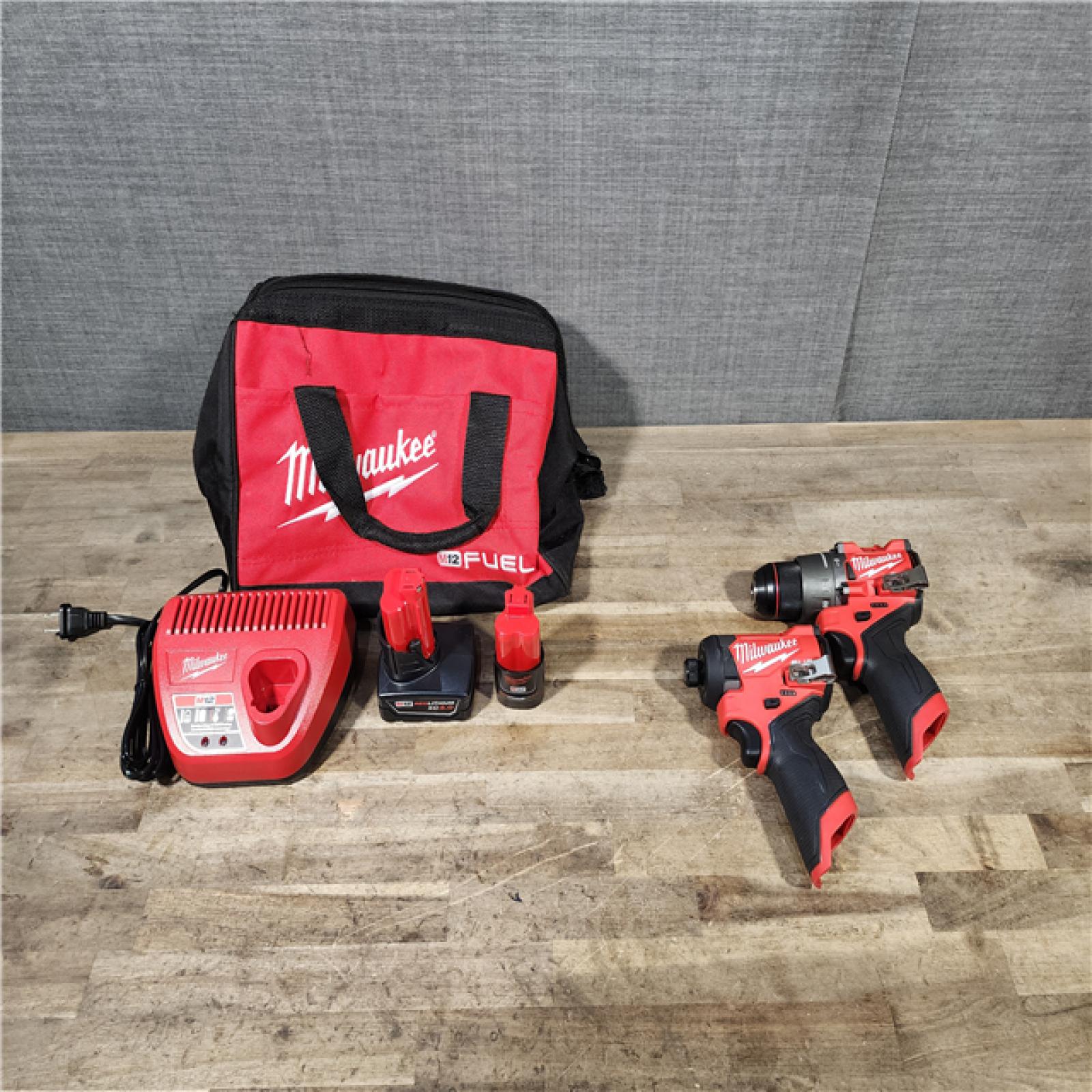 HOUSTON LOCATION - AS-IS (APPEARS LIKE NEW) Milwaukee 3497-22 12V Brushless Hammer Drill and Impact Driver Combo Kit