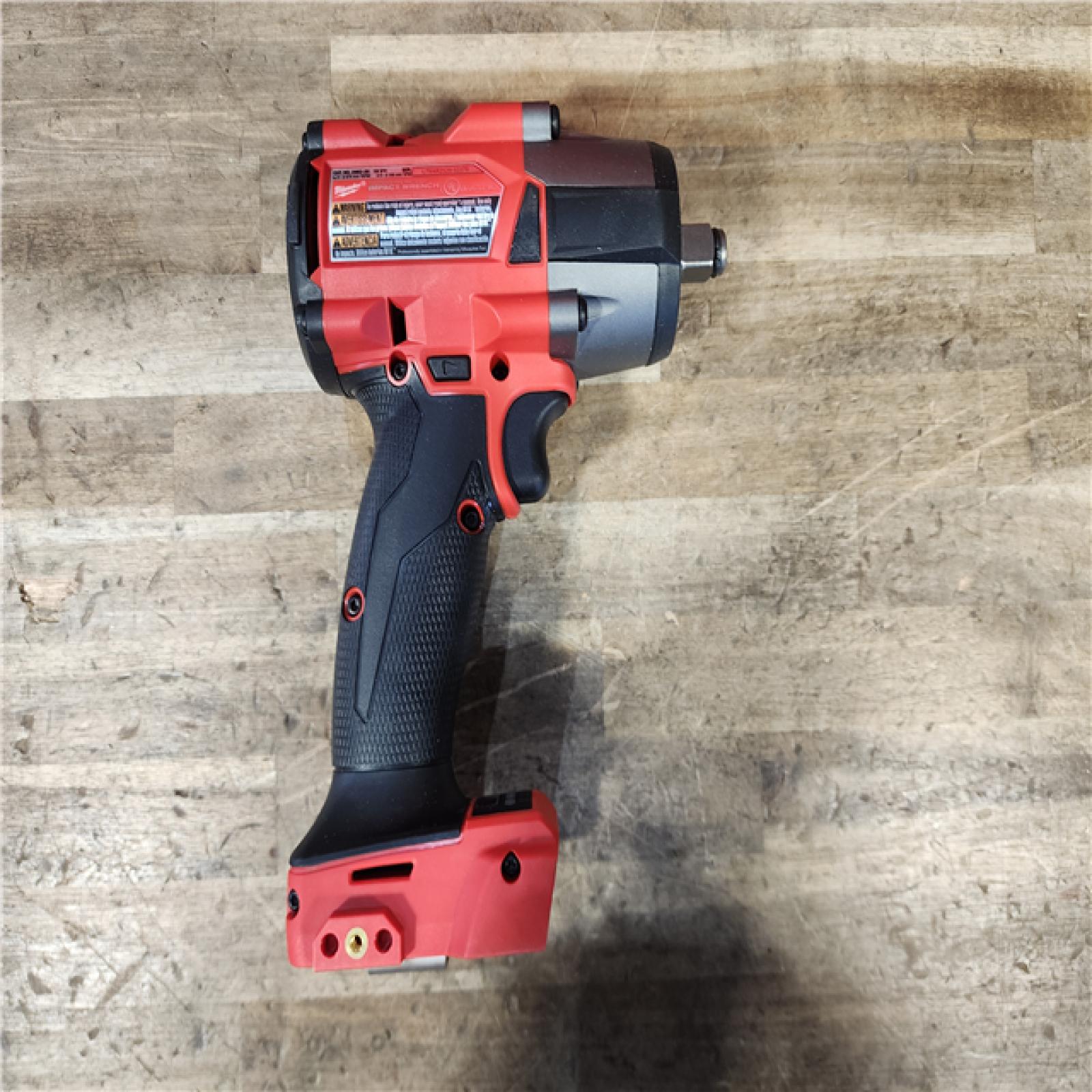 HOUSTON LOCATION - AS-IS (APPEARS LIKE NEW) Milwaukee 2962-20  M18 18V Fuel 1/2 Mid-Torque Impact Wrench Cordless Lithium-Ion Brushless (Tool-Only)