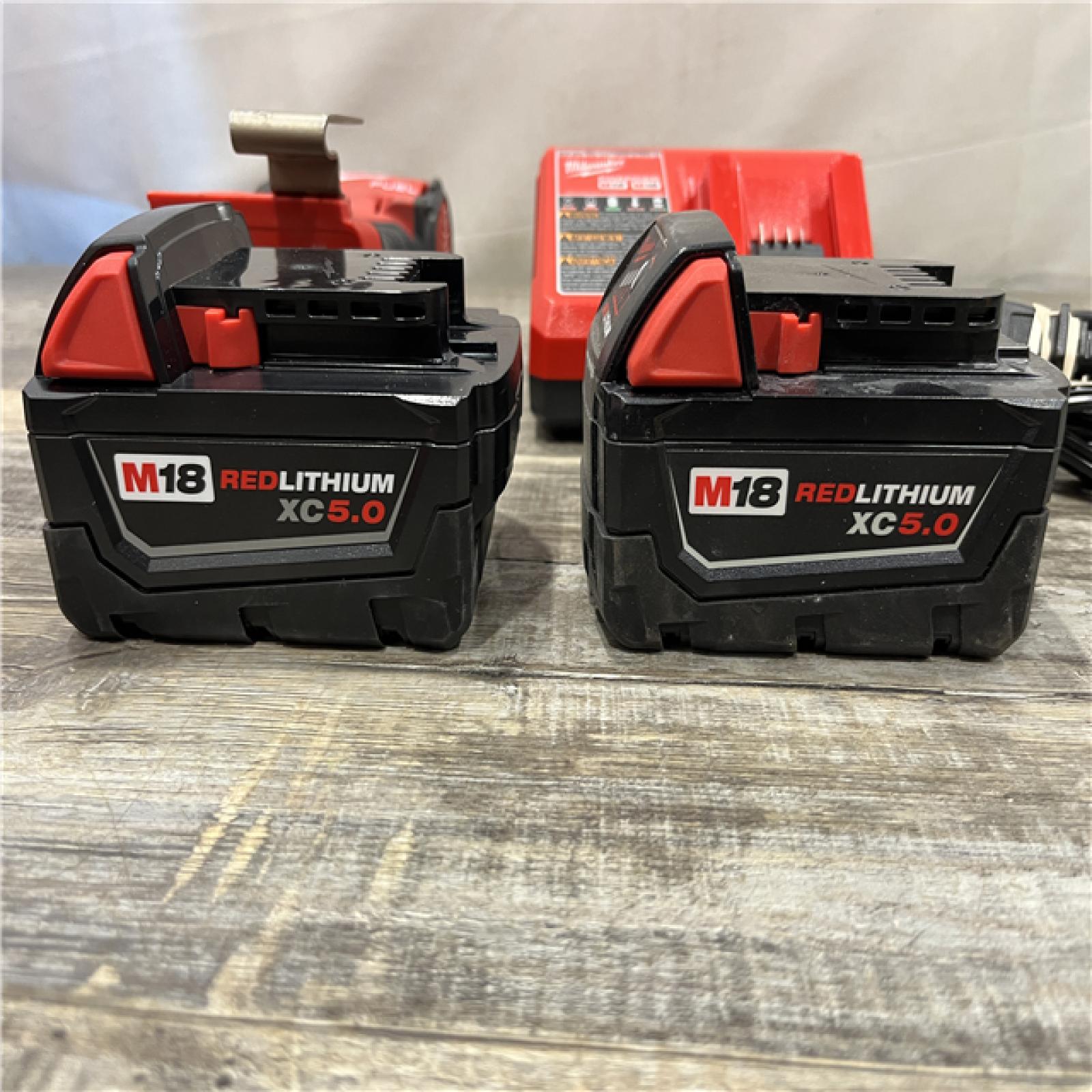 AS-IS Milwaukee FUEL 18V Lithium-Ion Brushless Cordless 1/4 in. Hex Impact Driver Kit