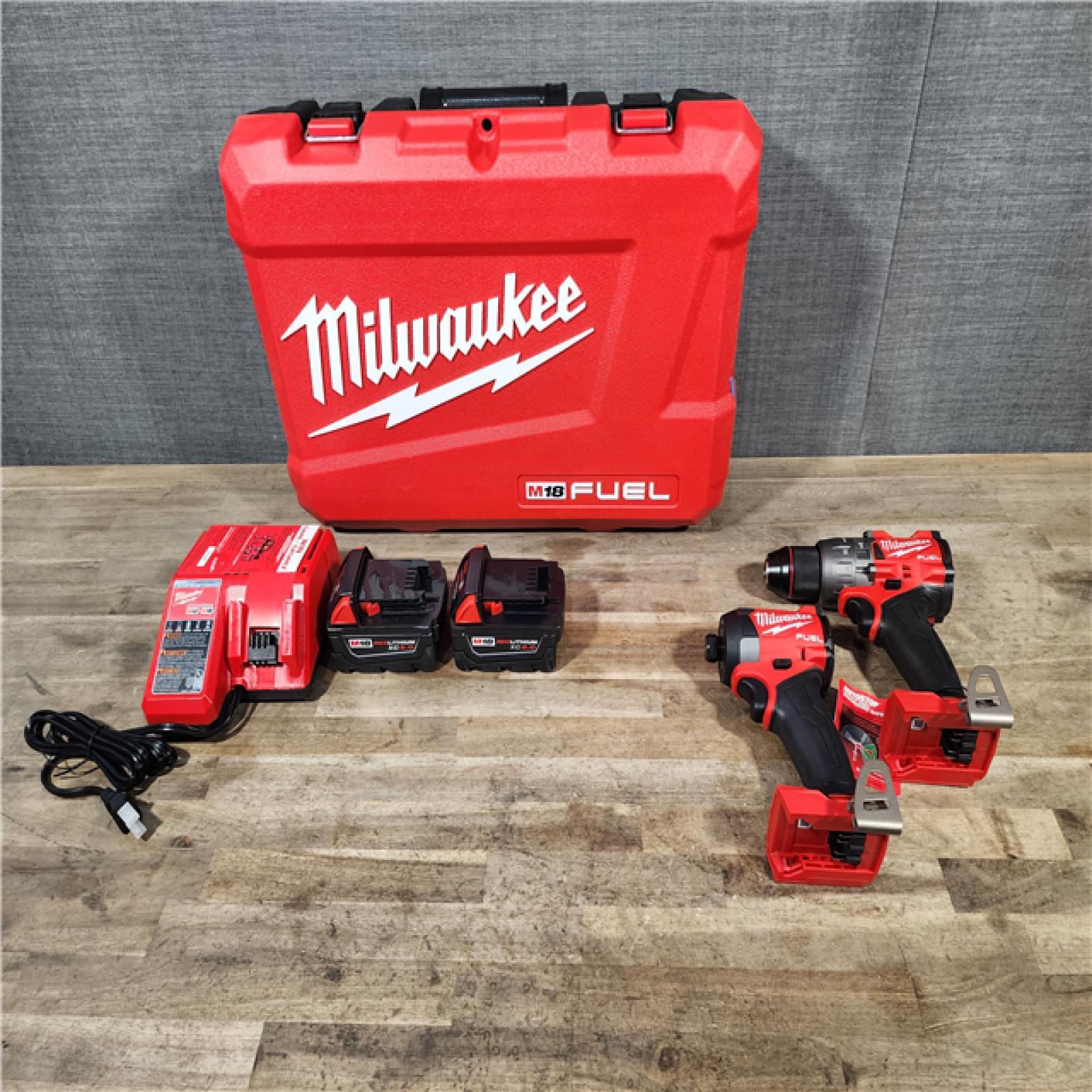 HOUSTON LOCATION - AS-IS (APPEARS LIKE NEW) M18 FUEL 18V Lithium-Ion Brushless Cordless Hammer Drill and Impact Driver Combo Kit (2-Tool) with 2 Batteries