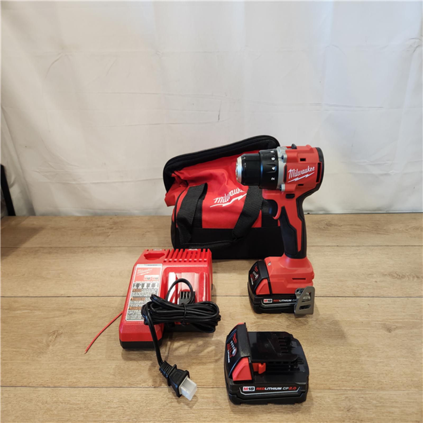 AS-IS- Milwaukee 18V Lithium-Ion Brushless Cordless 1/2 in. Compact Drill/Driver Kit
