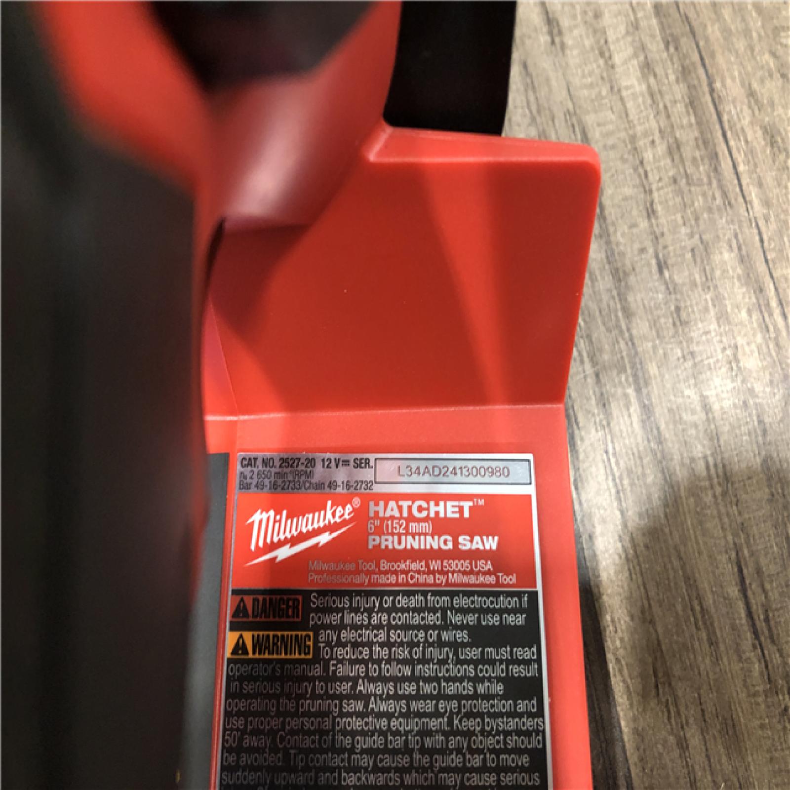 AS-IS Milwaukee FUEL 12V Lithium-Ion Brushless Battery 6 in. HATCHET Pruning Saw Kit