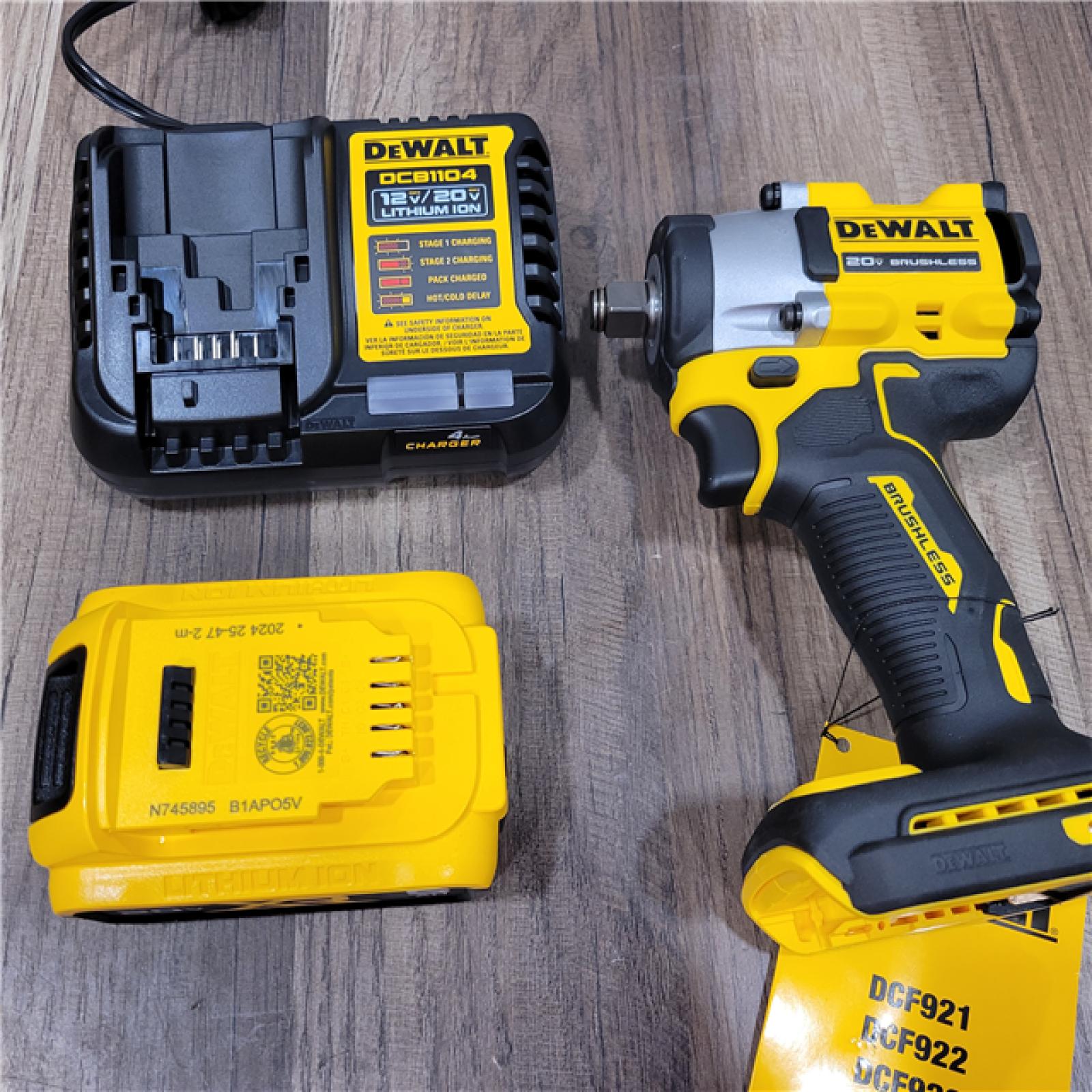 LIKE NEW! DEWALT ATOMIC 20V MAX Lithium-Ion Brushless Cordless 1/2 in. Variable Speed Impact Wrench Kit with 5 Ah Battery and Charger
