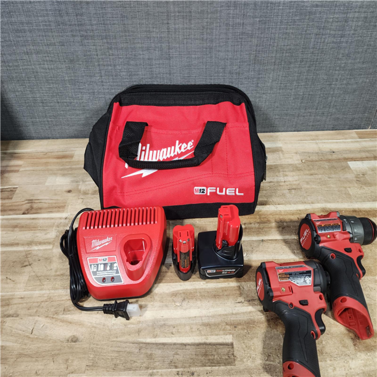 HOUSTON LOCATION - AS - IS Milwaukee FUEL 12-Volt Lithium-Ion Brushless Cordless Hammer Drill and Impact Driver Combo Kit