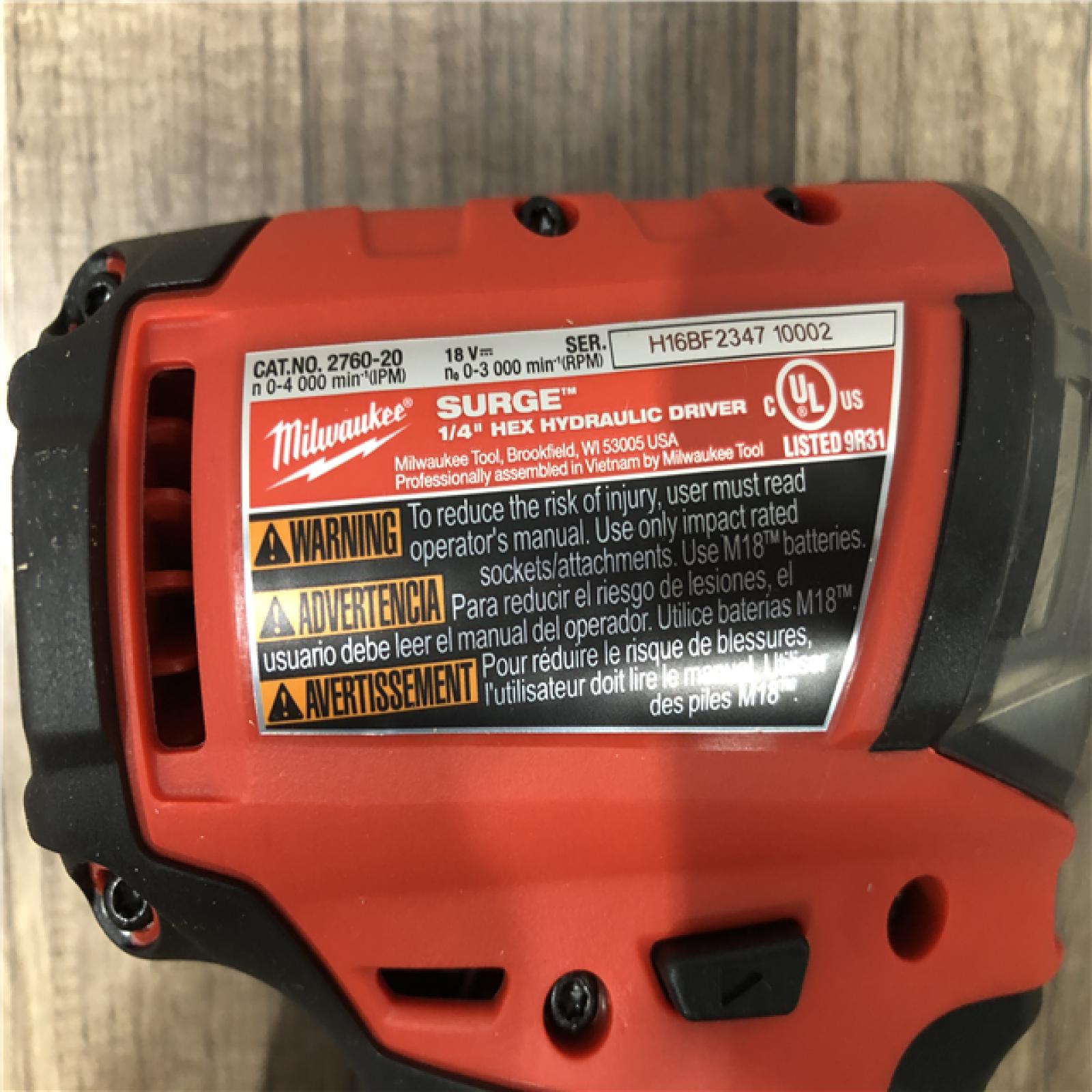AS-IS Milwaukee FUEL SURGE 18V Lithium-Ion Brushless Cordless 1/4 in. Hex Impact Driver (Tool-Only)