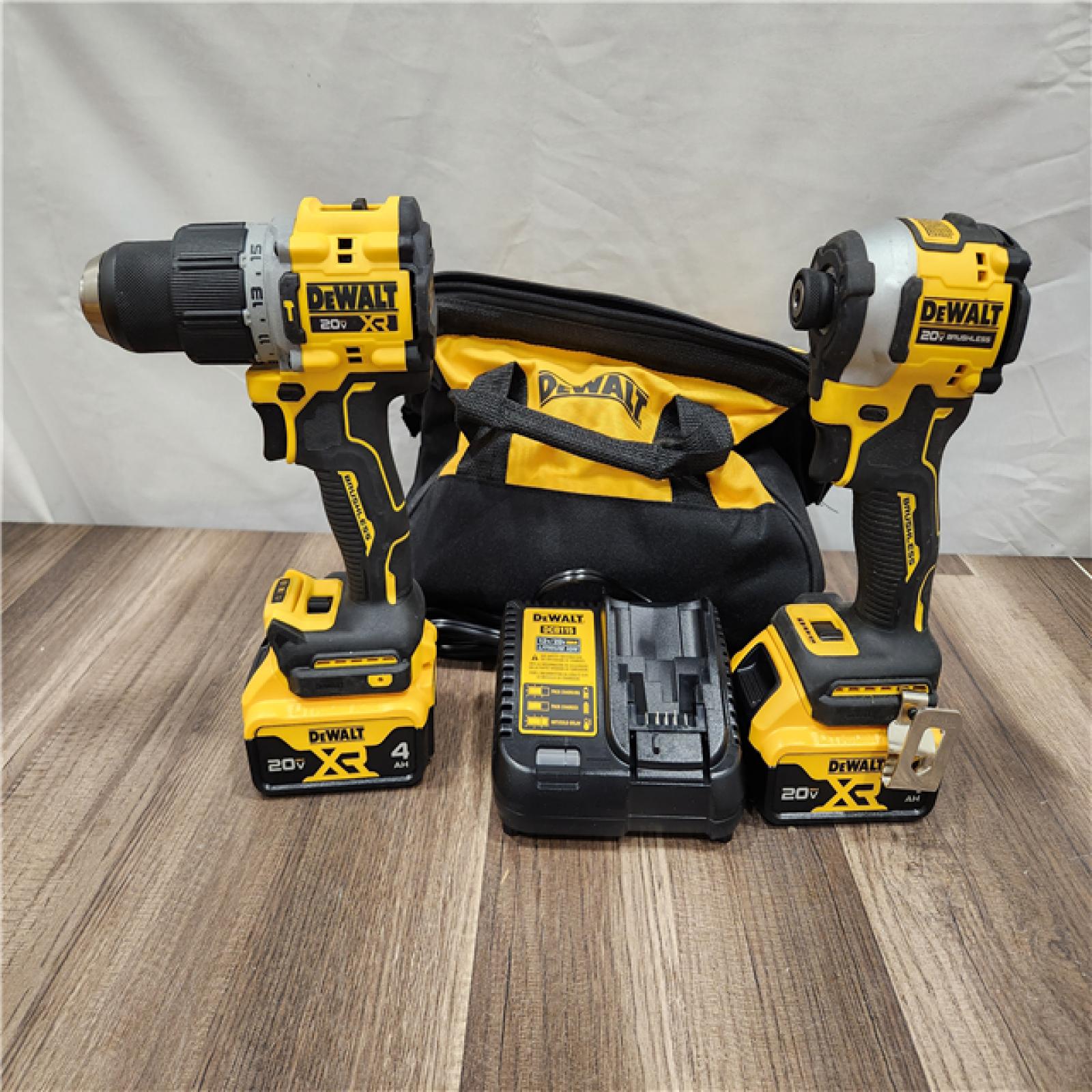 AS-IS DEWALT 20V MAX XR Hammer Drill and ATOMIC Impact Driver 2 Tool Cordless Combo Kit with (2) 4.0Ah Batteries, Charger, and Bag