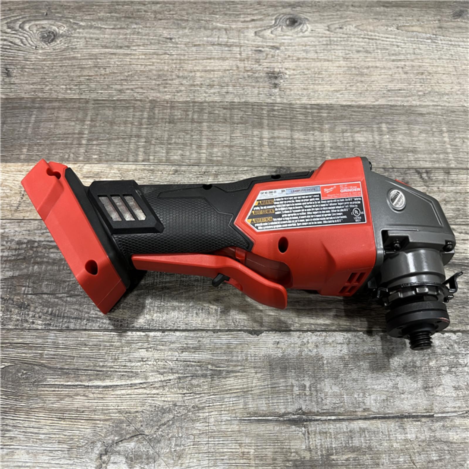 AS-IS Milwaukee FUEL 18V Lithium-Ion Brushless Cordless 4-1/2 in./5 in. Grinder w/Paddle Switch (Tool-Only)