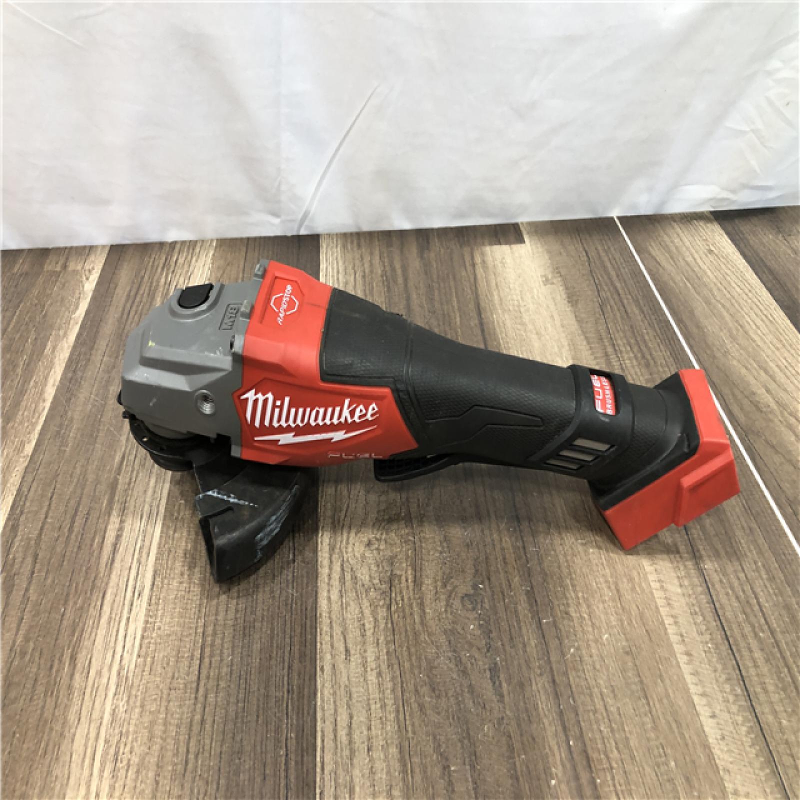 AS-IS Milwaukee FUEL 18-Volt Lithium-Ion Brushless Cordless 4-1/2 in./6 in. Braking Grinder with Paddle Switch (Tool-Only)