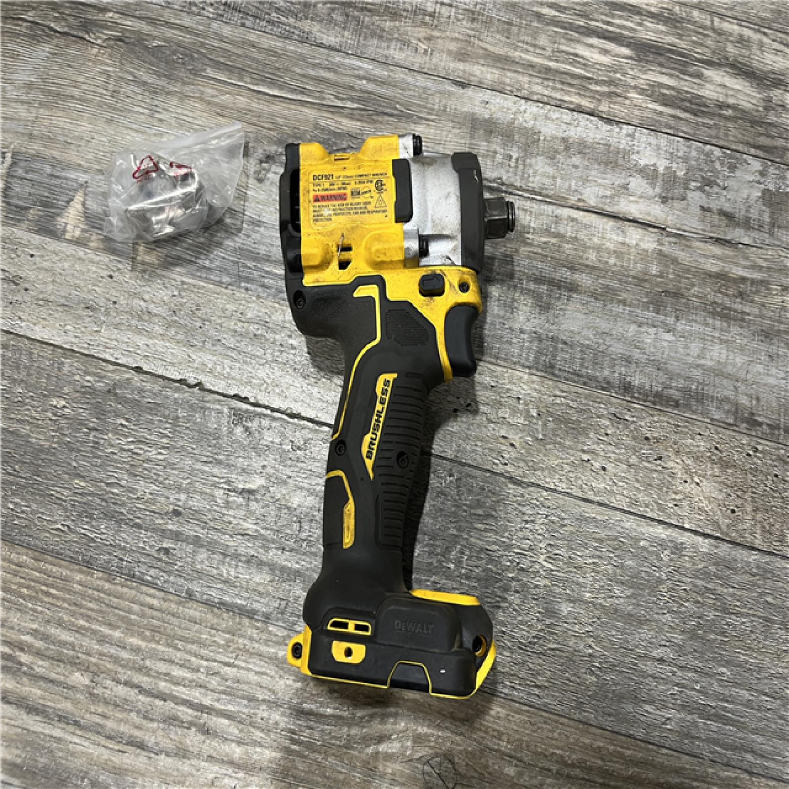 AS-IS DEWALT ATOMIC 20V MAX Cordless Brushless 1/2 in. Variable Speed Impact Wrench (Tool Only)