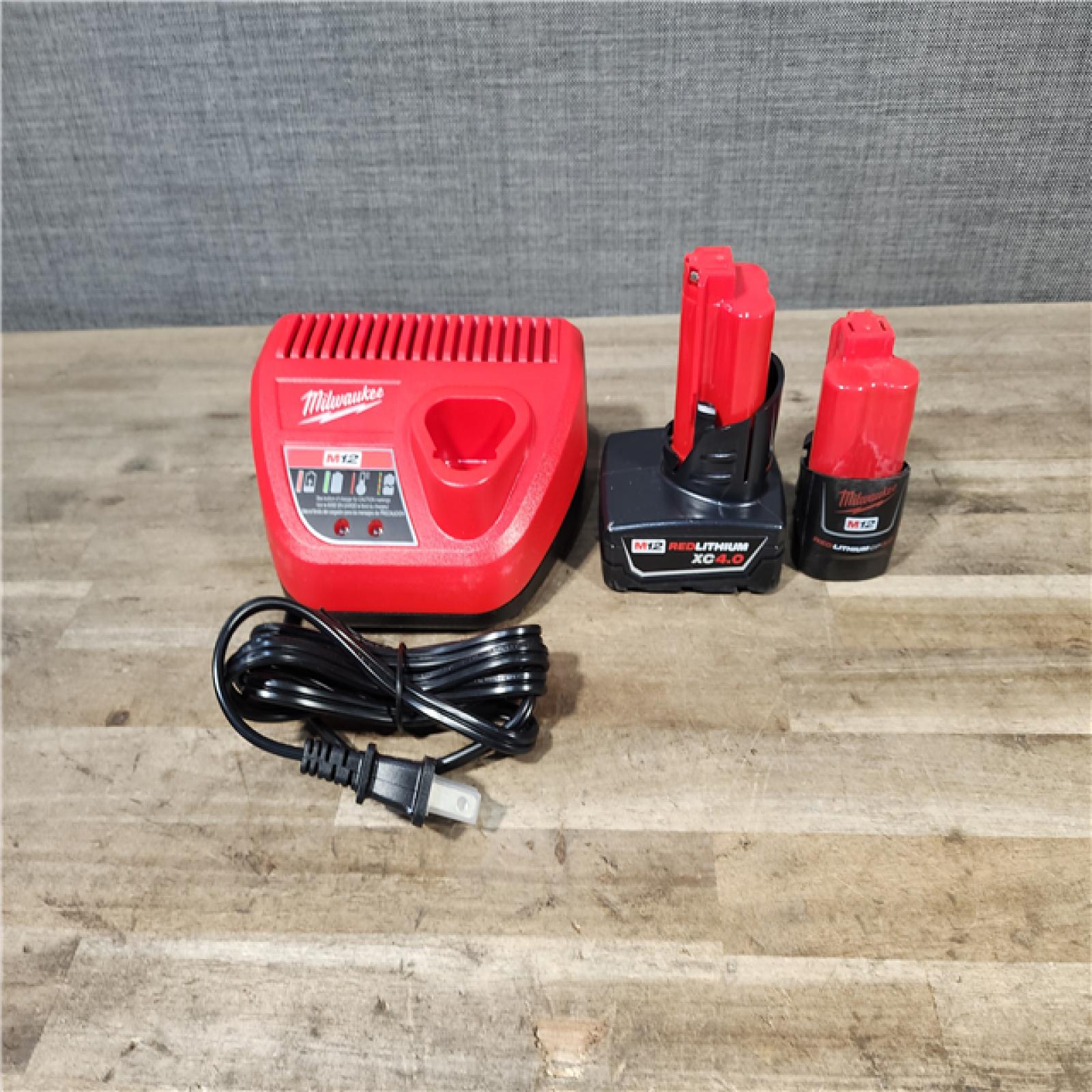 HOUSTON LOCATION - AS-IS MILWAUKEE 3 TOOL COMBO KIT W/ (2) BATTERY & CHARGER
