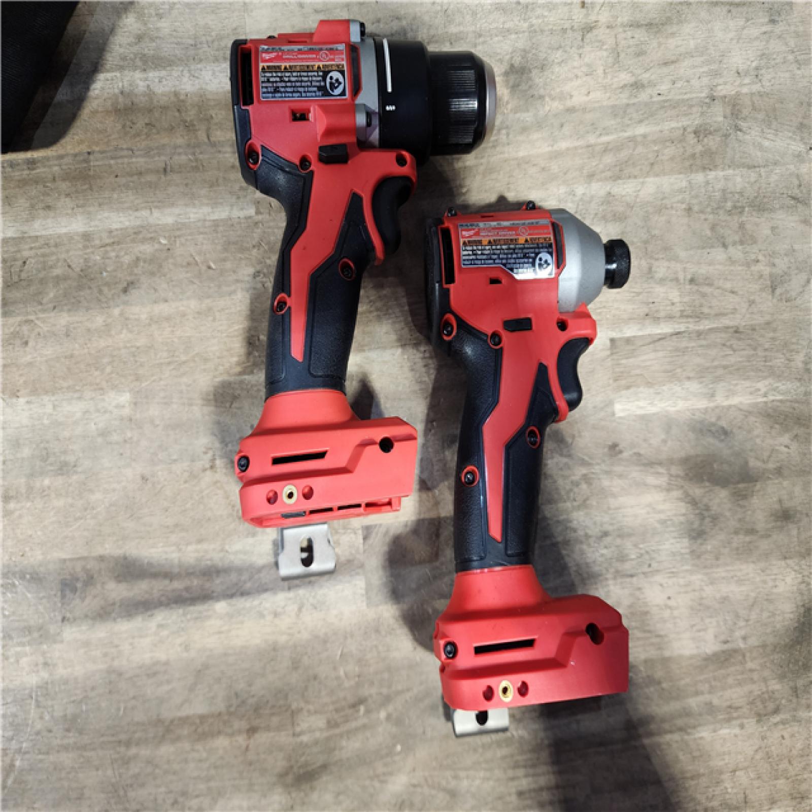 HOUSTON LOCATION - AS-IS Milwaukee M18 18V Lithium-Ion Brushless Cordless Compact Drill/Impact Combo Kit (2-Tool) W/(2) 2.0 Ah Batteries  Charger & Bag