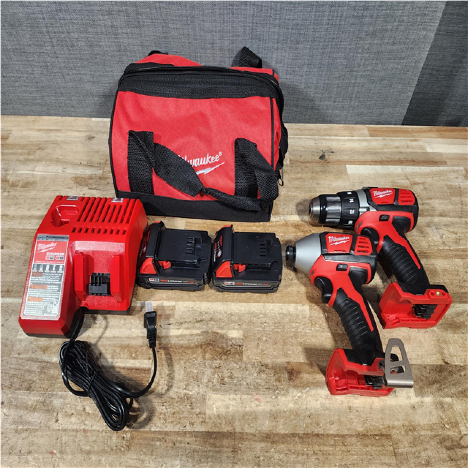 HOUSTON LOCATION - AS - IS Milwaukee 18V Lithium-Ion Cordless Drill Driver/Impact Driver Combo Kit