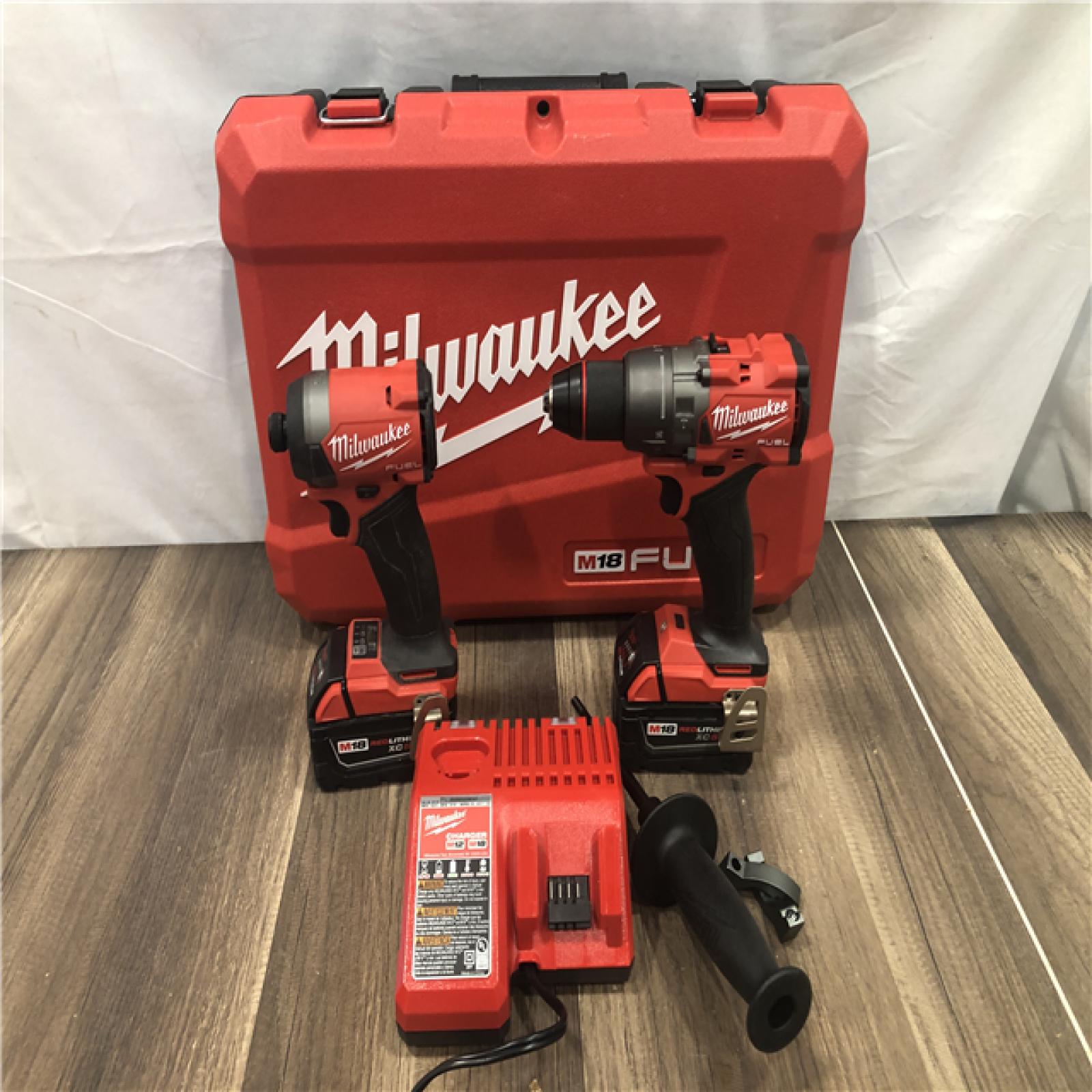 AS-IS Milwaukee FUEL 18V Lithium-Ion Brushless Cordless Hammer Drill and Impact Driver Combo Kit