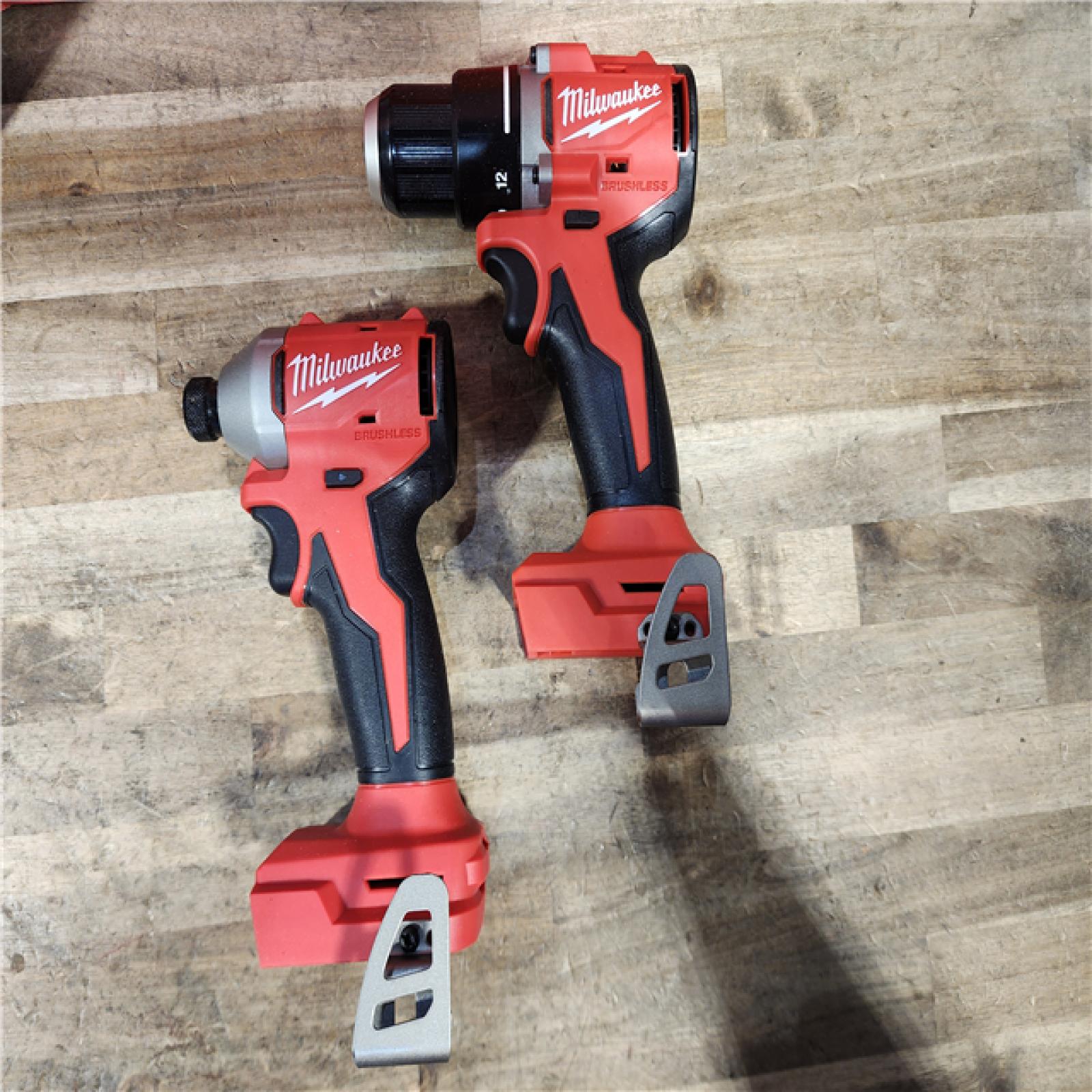 HOUSTON LOCATION - AS-IS Milwaukee M18 18V Lithium-Ion Brushless Cordless Compact Drill/Impact Combo Kit (2-Tool) W/(2) 2.0 Ah Batteries  Charger & Bag