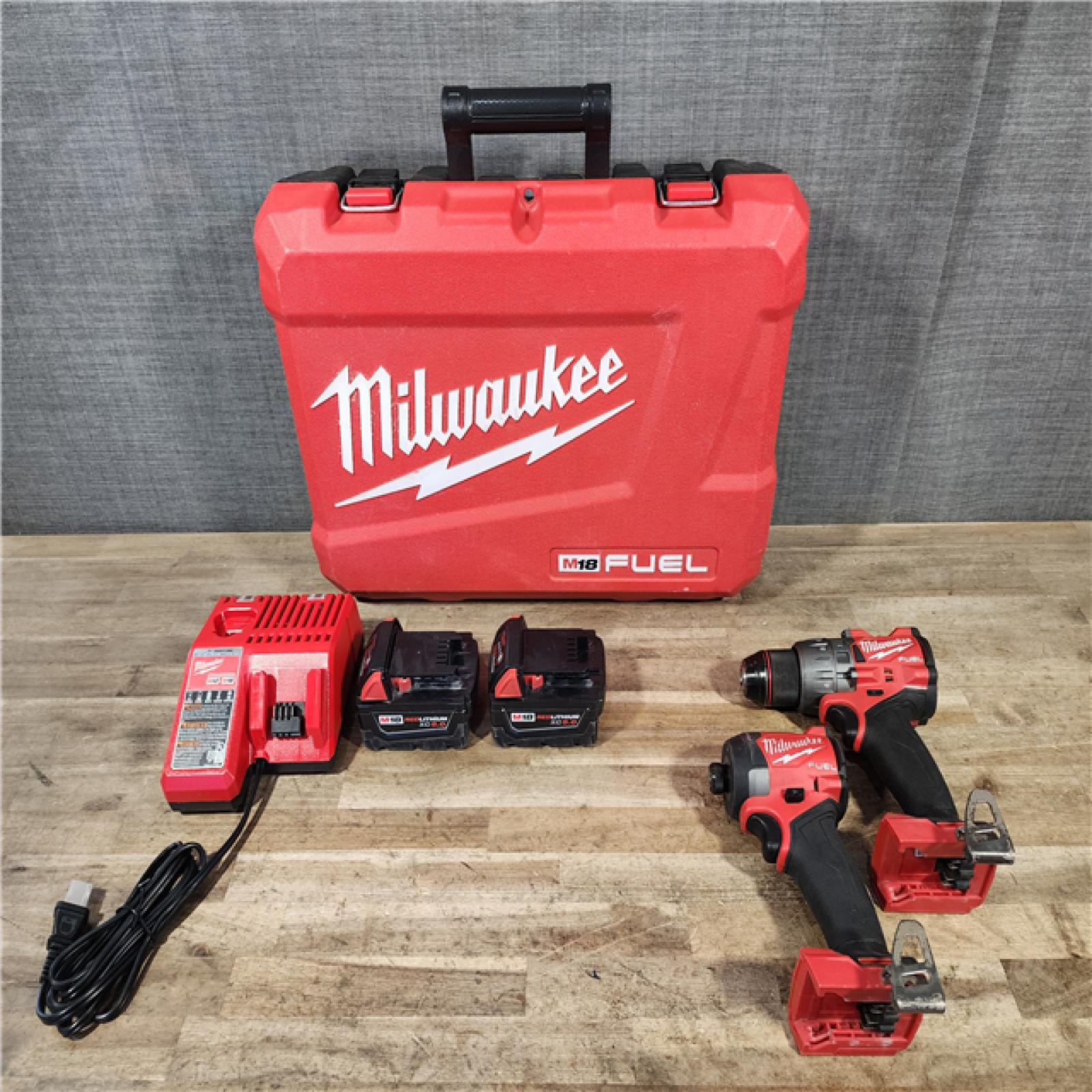 HOUSTON LOCATION - AS-IS Milwaukee FUEL 18V Lithium-Ion Brushless Cordless Hammer Drill and Impact Driver Combo Kit