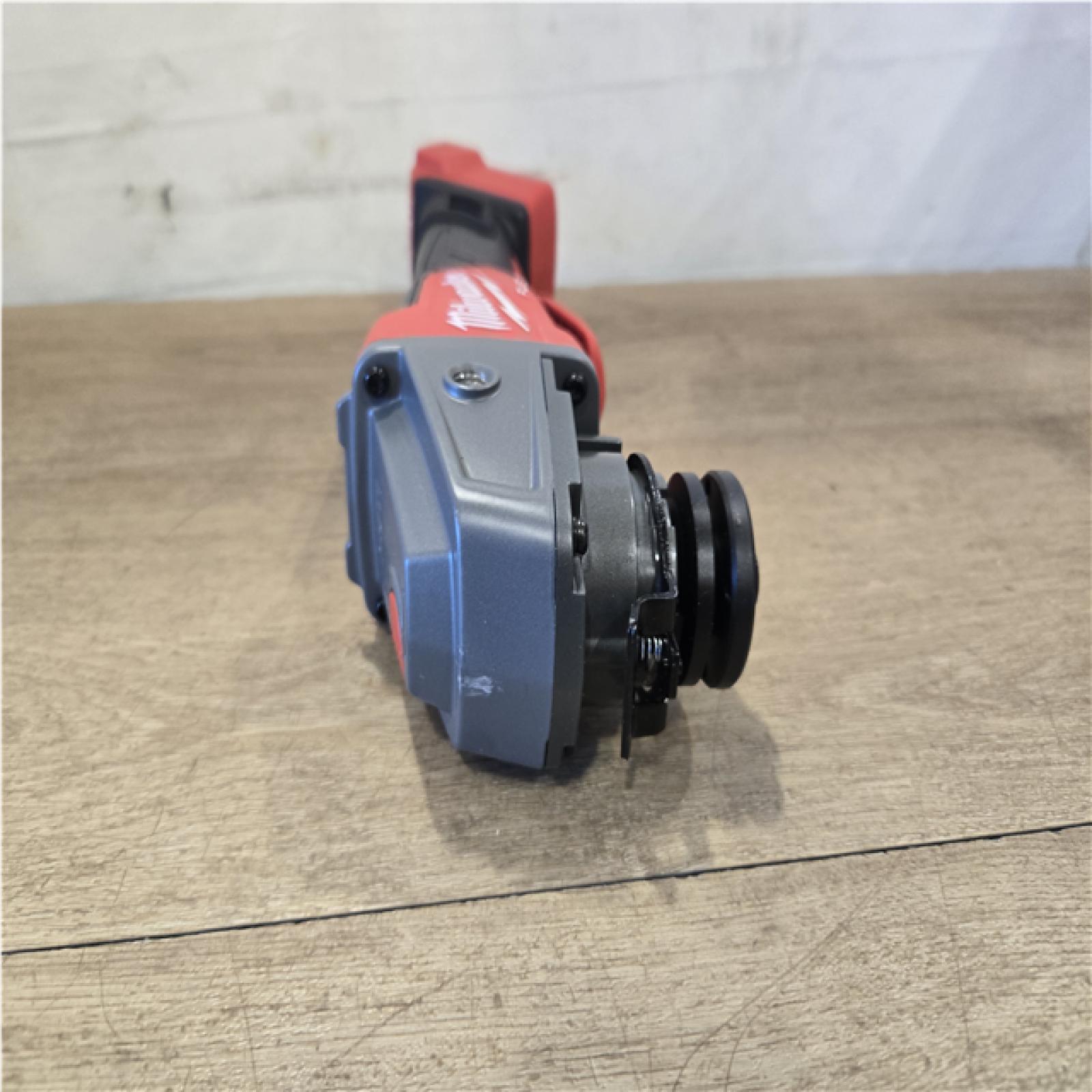 AS-IS Milwaukee FUEL 18V Lithium-Ion Brushless Cordless 4-1/2 in./5 in. Grinder w/Paddle Switch (Tool-Only)