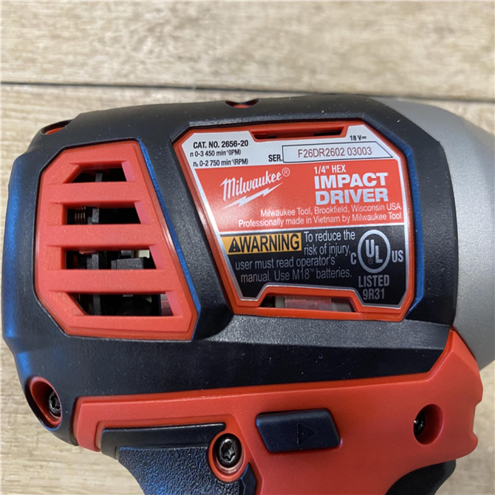 AS-IS Milwaukee 18V Lithium-Ion Cordless 1/4 in. Hex Impact Driver (Tool-Only)