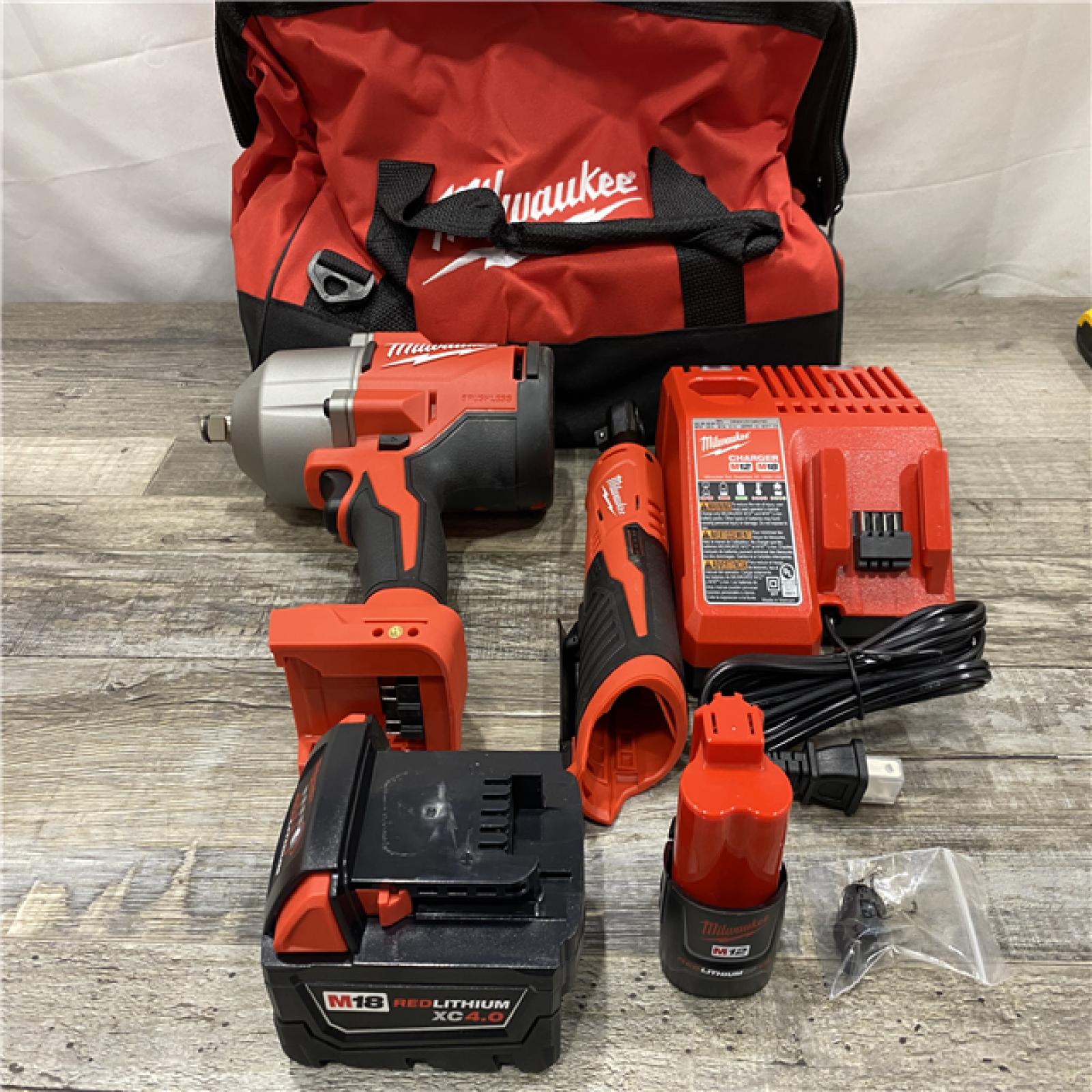 AS-IS Milwaukee 12/18V Lithium-Ion Cordless 3/8 in. Ratchet and 1/2 in. High Torque Impact Wrench with Friction Ring Combo Kit