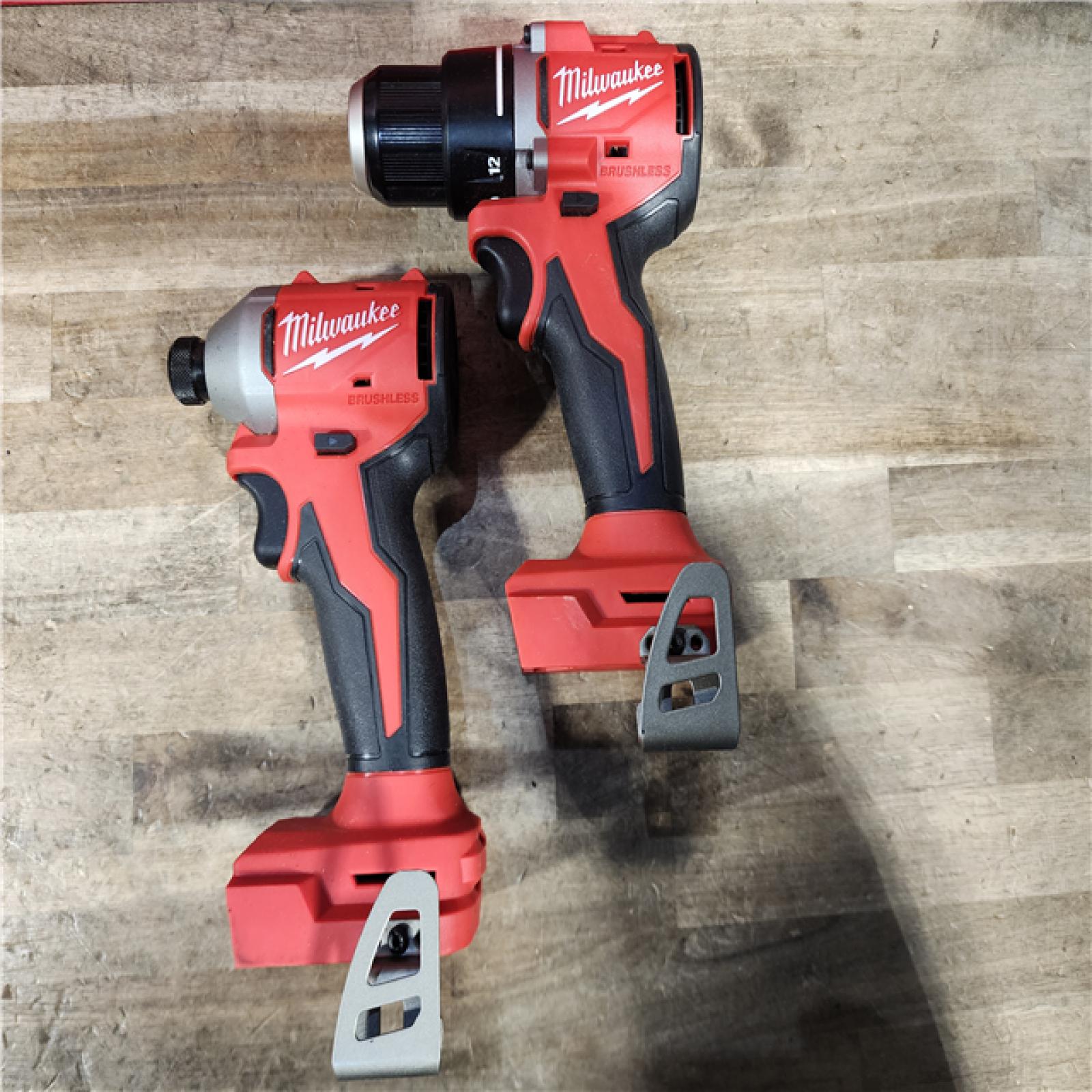 HOUSTON LOCATION - AS-IS Milwaukee M18 18V Lithium-Ion Brushless Cordless Compact Drill/Impact Combo Kit (2-Tool) W/(2) 2.0 Ah Batteries  Charger & Bag