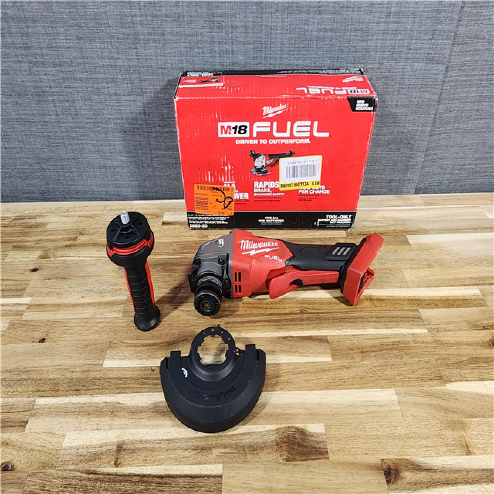 HOUSTON LOCATION - AS-IS Milwaukee 2880-20 M18 FUEL 18-Volt Lithium-Ion Brushless Cordless 4-1/2 in./5 in. Grinder W/Paddle Switch (Tool-Only)