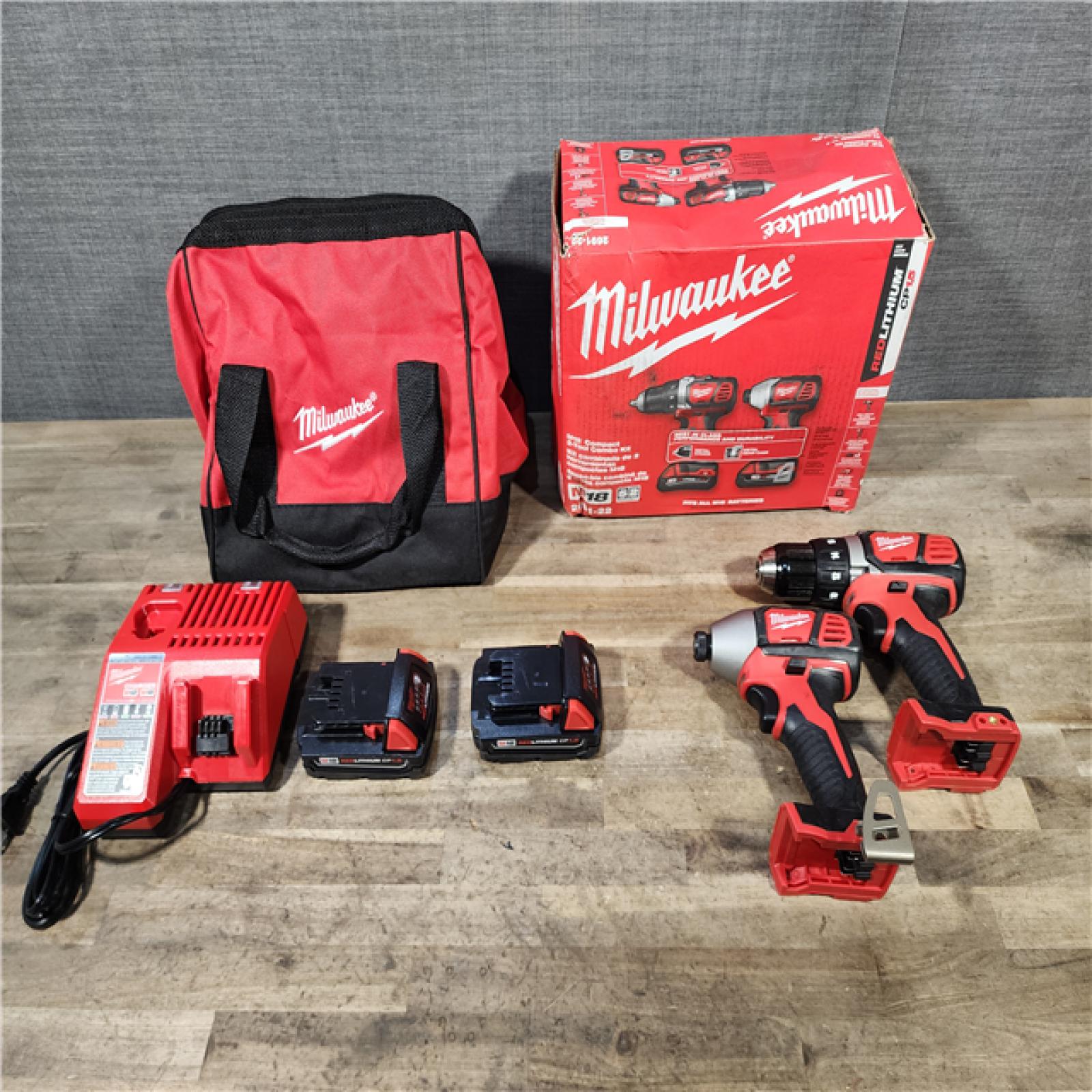 HOUSTON LOCATION - AS-IS Milwaukee 18V Cordless Brushed 2-Tool Drill/Driver and Impact Driver Kit