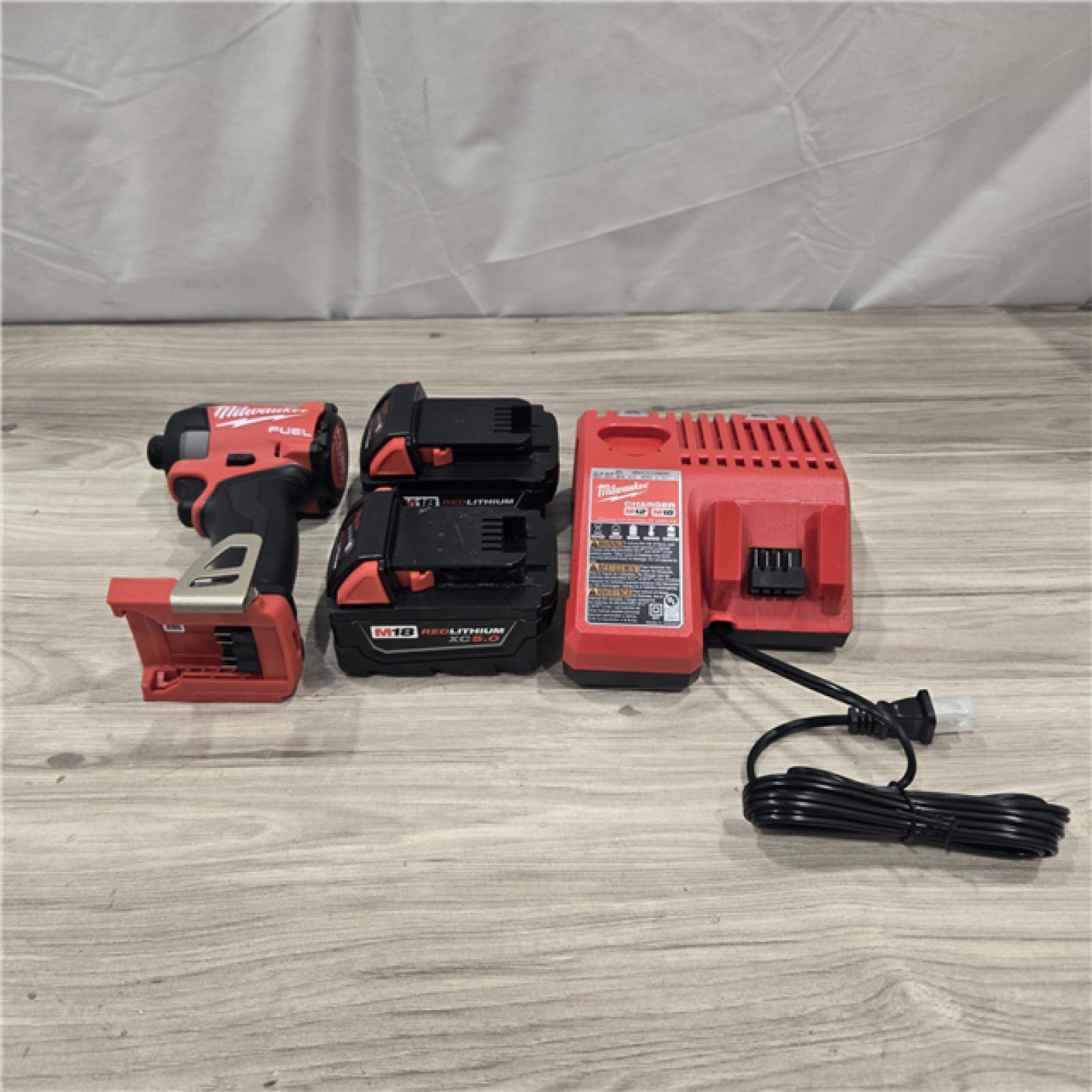 AS-IS Milwaukee 2953-22 M18 FUEL 1/4 Hex Impact Driver Kit