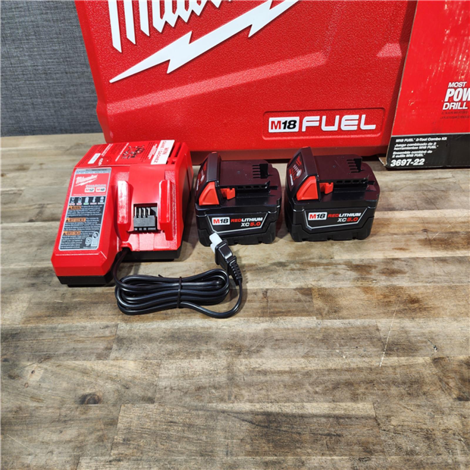 HOUSTON LOCATION - AS-IS (APPEARS LIKE NEW) MILWAUKEE FUEL 18V Lithium-Ion Brushless Cordless Hammer Drill and Impact Driver Combo Kit (2-Tool) with 2 Batteries