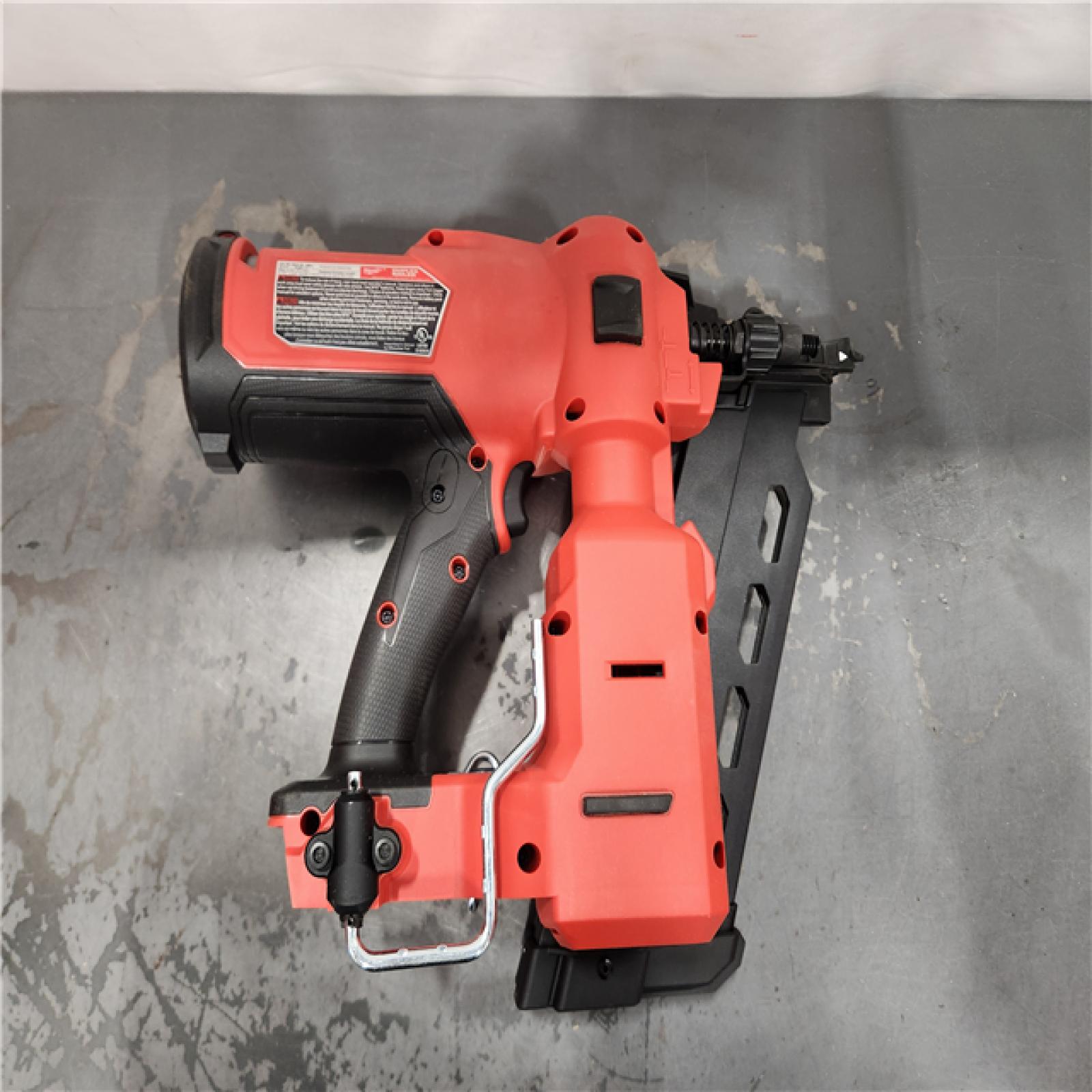 AS-IS- Nail Gun Cordless Strip Plastic 18 V