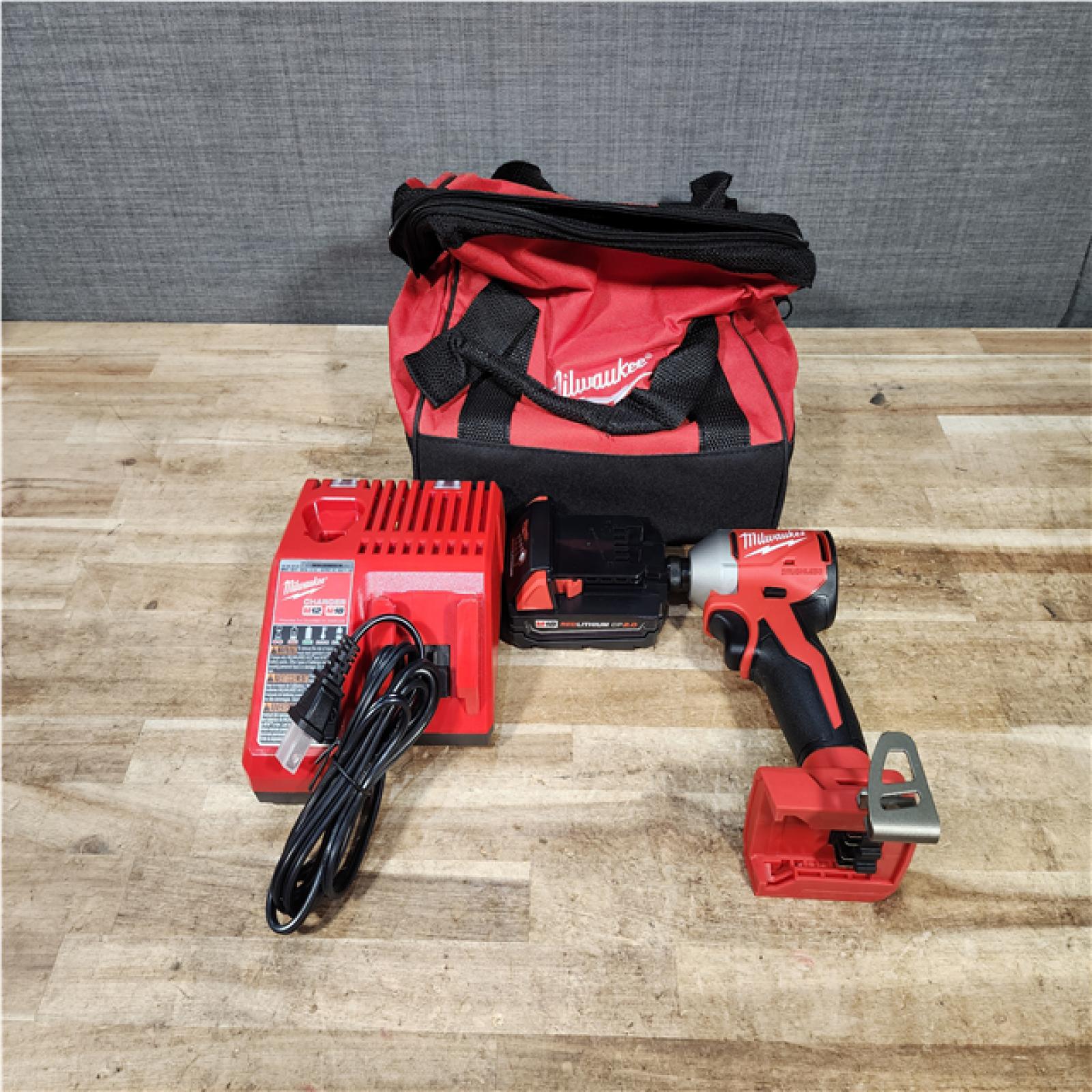 HOUSTON LOCATION - AS - IS Milwaukee 18-Volt Lithium-Ion Compact Brushless Cordless 1/4 in. Impact Driver Kit