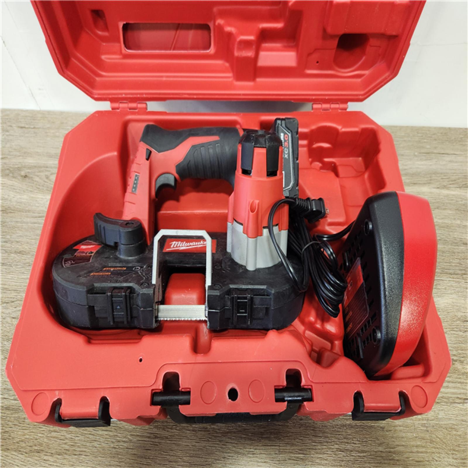 Phoenix Location NEW Milwaukee M12 12V Lithium-Ion Cordless Sub-Compact Band Saw XC Kit with One 3.0h Battery, Charger and Hard Case