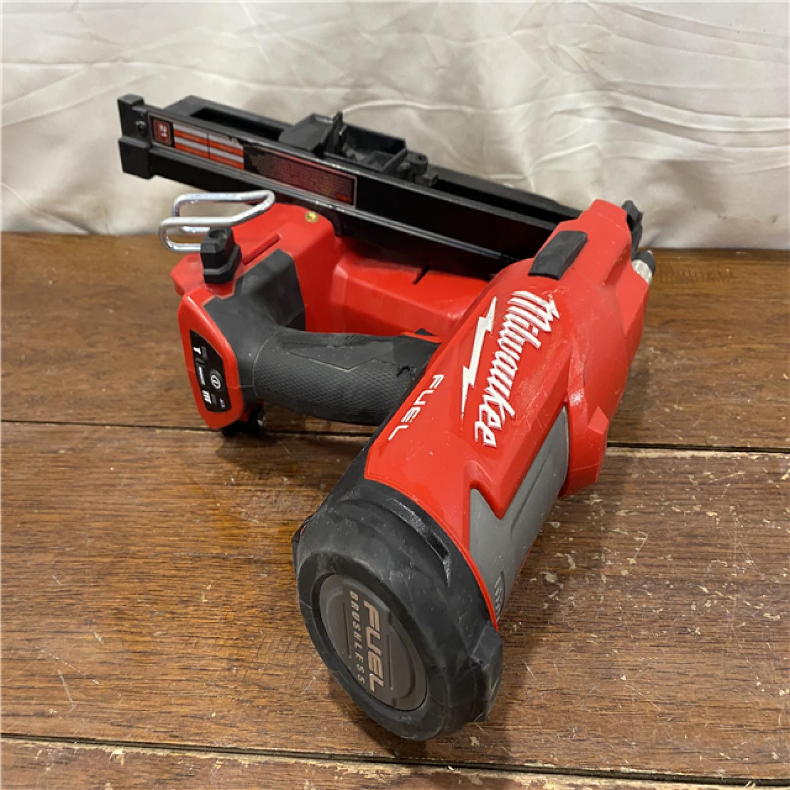 AS-IS Milwaukee 2744-20 M18 FUEL 3-1/2 in. 18-Volt 21-Degree Lithium-Ion Brushless Cordless Framing Nailer (Tool-Only)