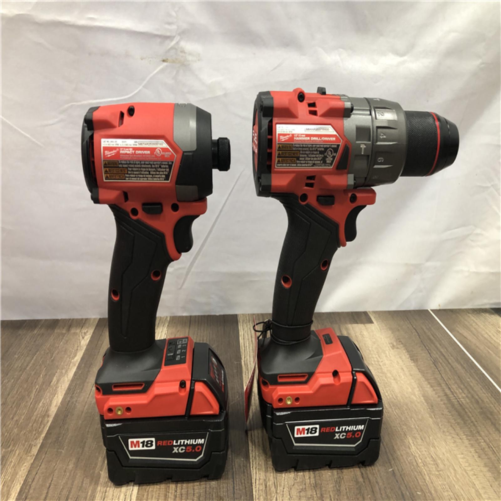 AS-IS Milwaukee FUEL 18V Lithium-Ion Brushless Cordless Hammer Drill and Impact Driver Combo Kit